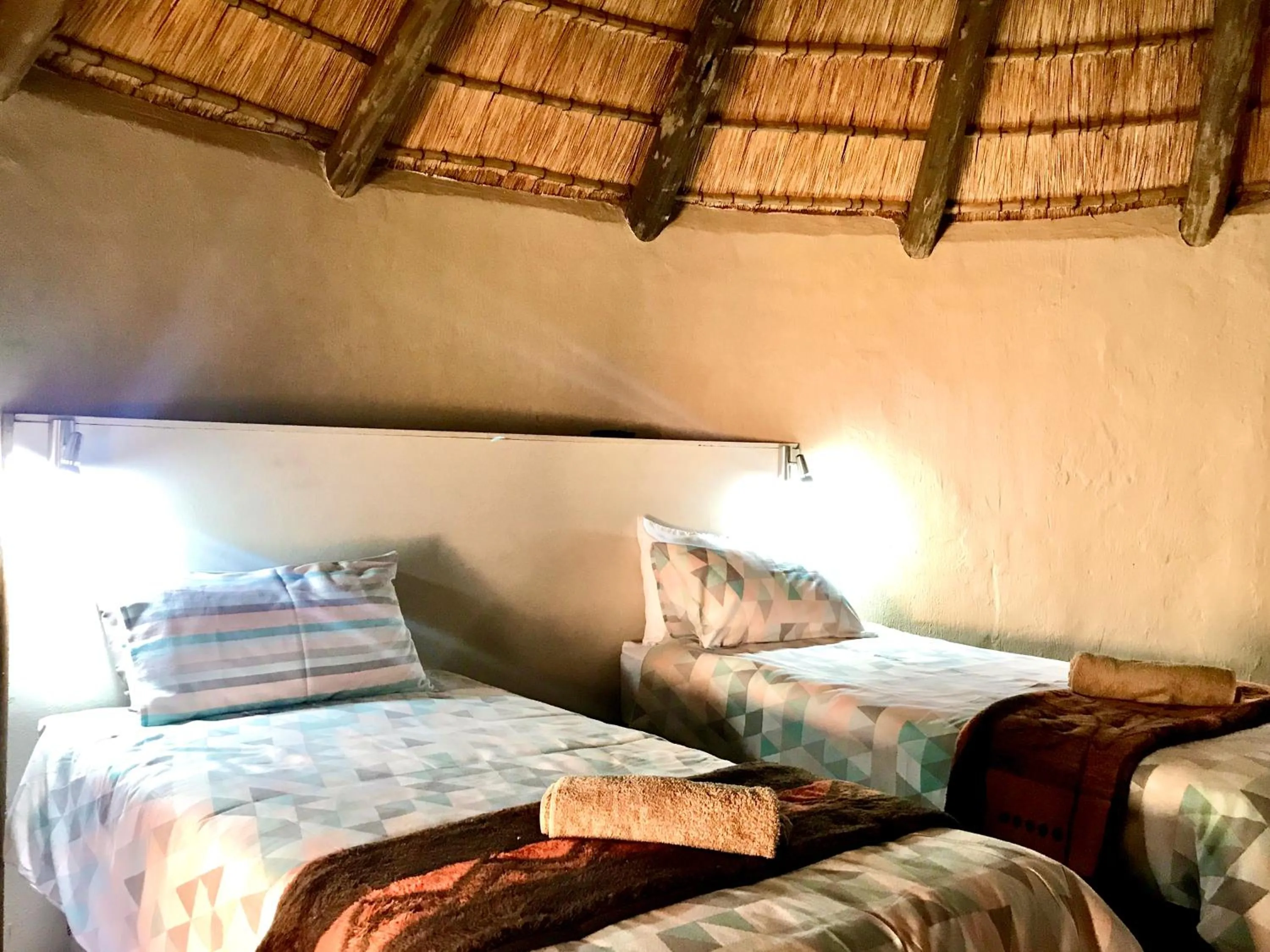 Bed in Kwakunje Guest Lodge