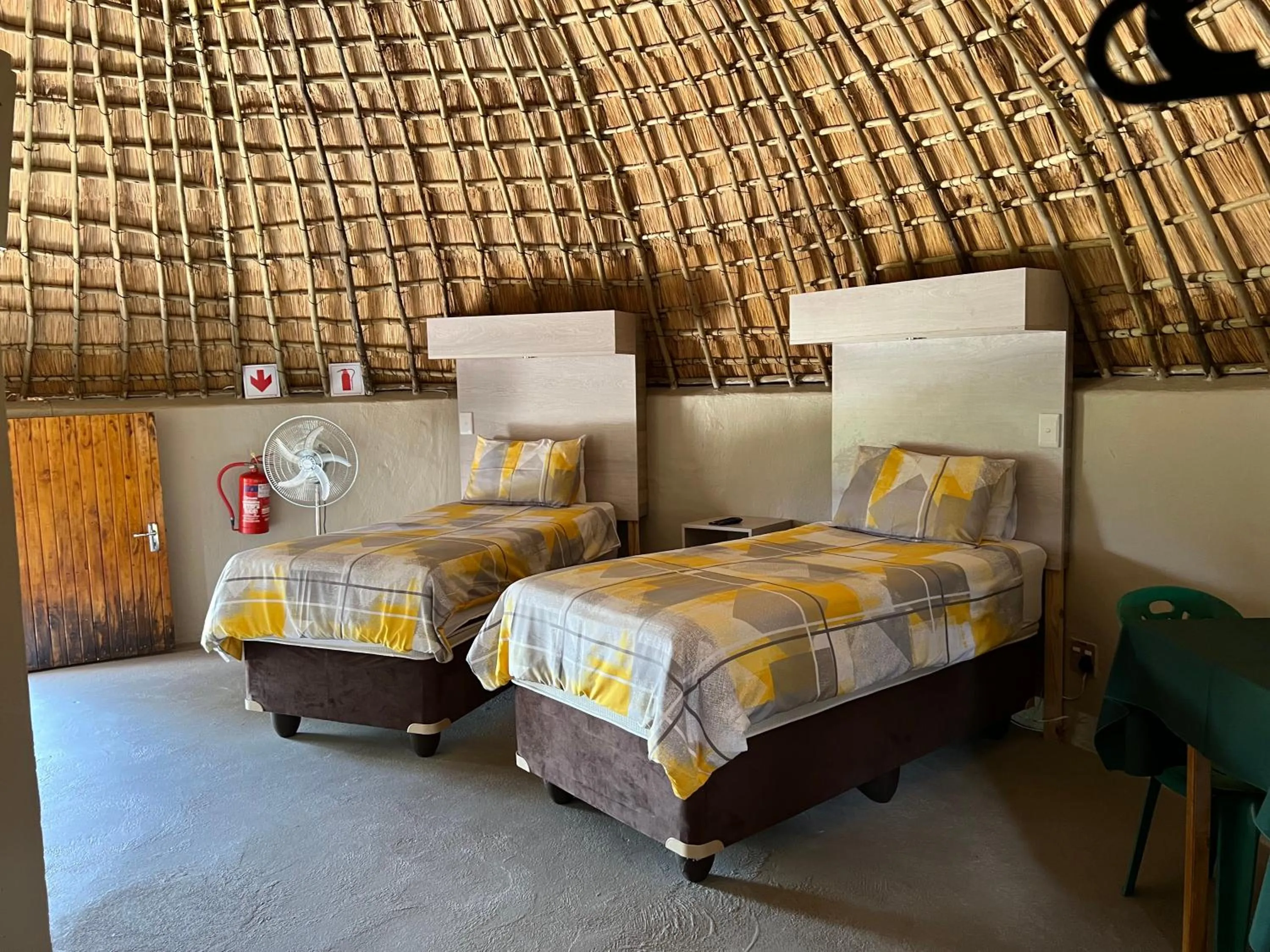 Bed in Kwakunje Guest Lodge