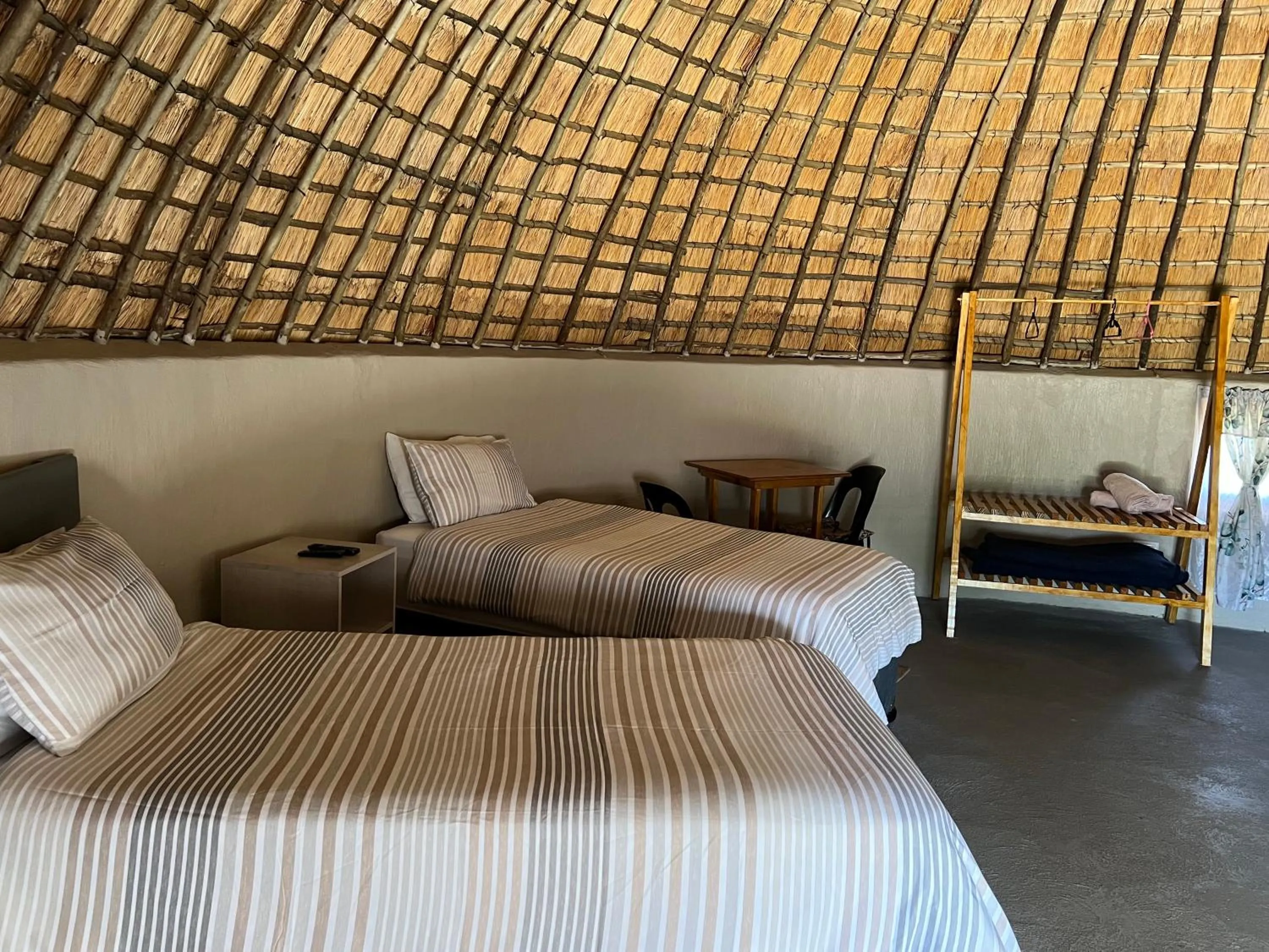 Bed in Kwakunje Guest Lodge