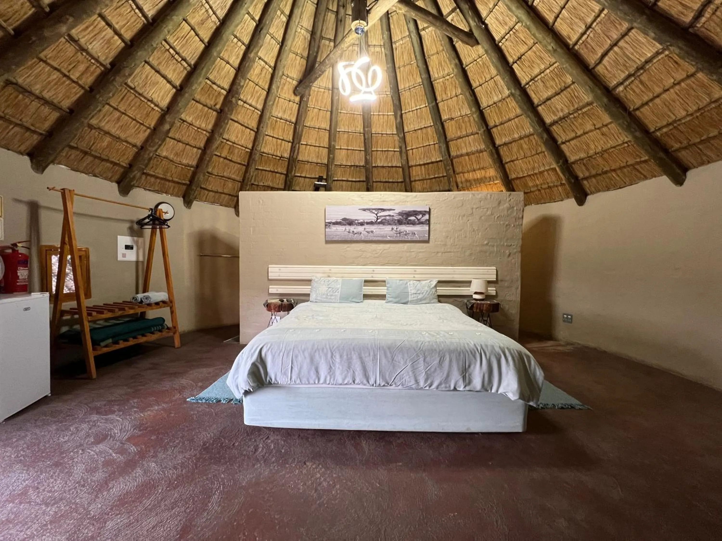 Bed in Kwakunje Guest Lodge