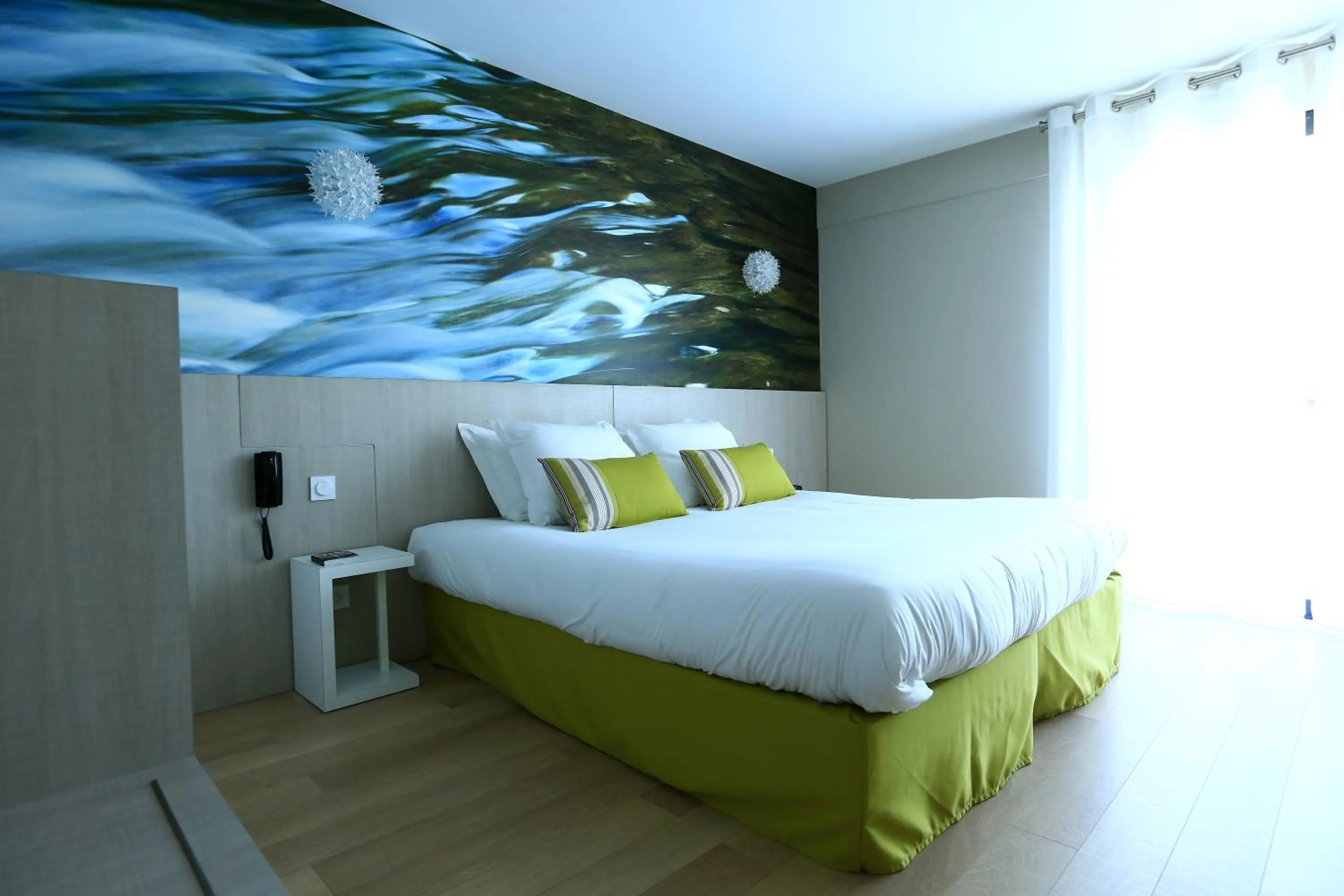 Bed in SOWELL HOTELS Domaine de la Petite Isle