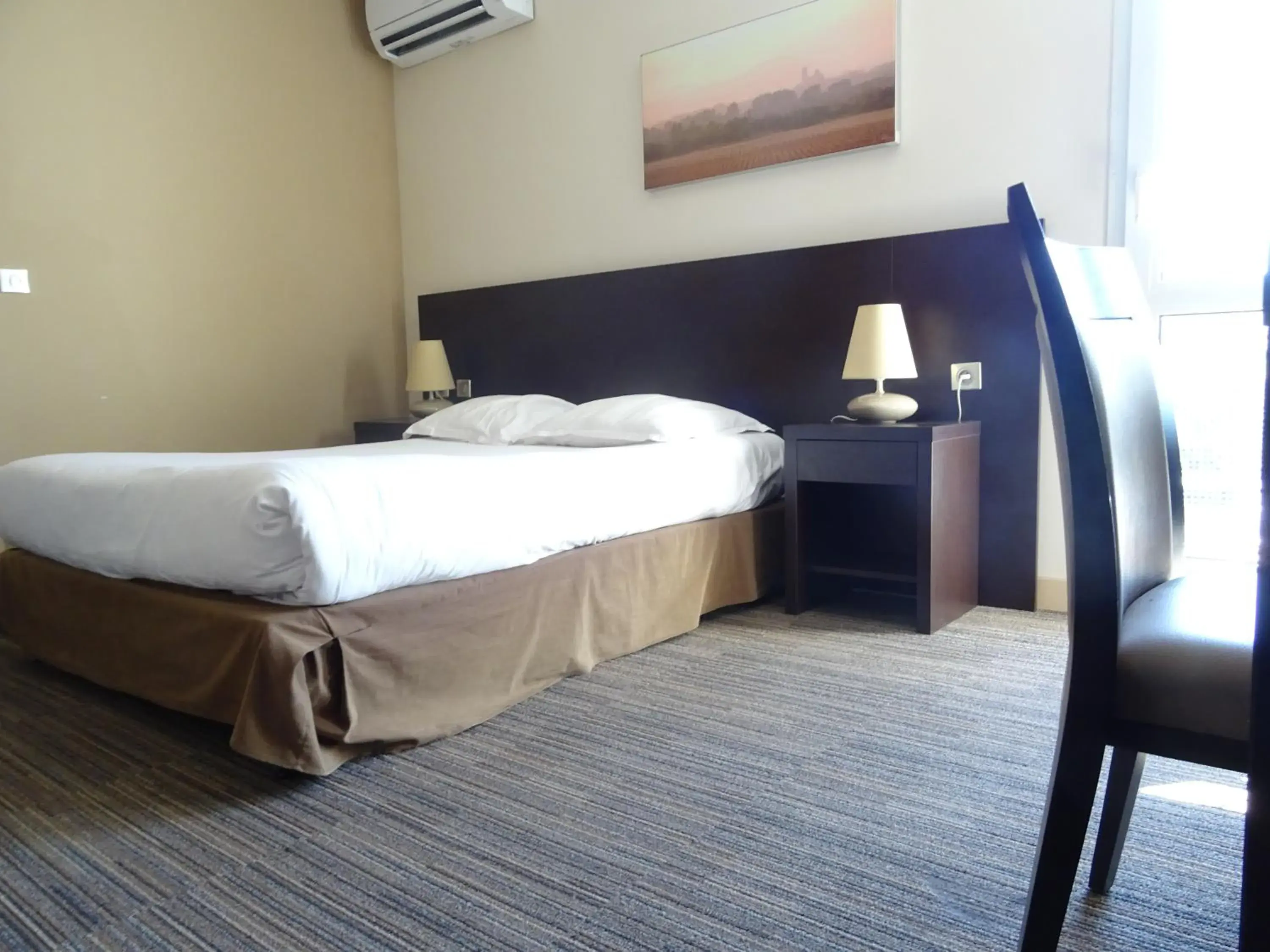 Double or Twin Room with Garden Access in SOWELL HOTELS Domaine de la Petite Isle Double or Twin Room with Garden Access in SOWELL HOTELS Domaine de la Petite Isle