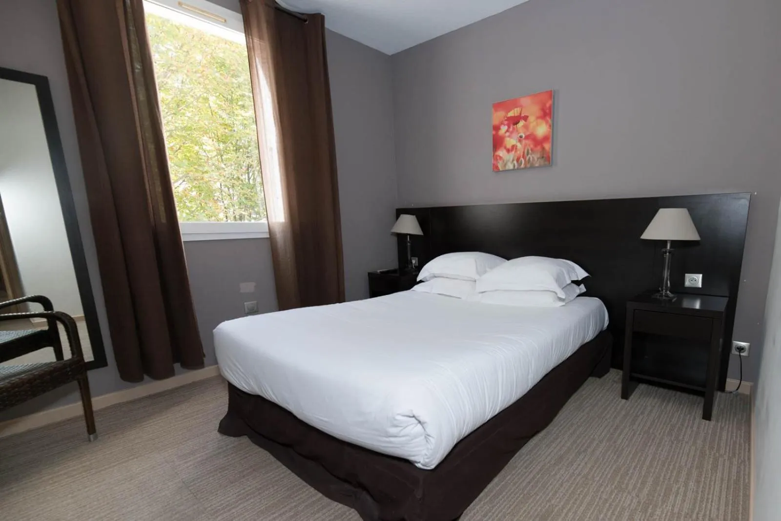 Photo of the whole room, Bed in SOWELL HOTELS Domaine de la Petite Isle