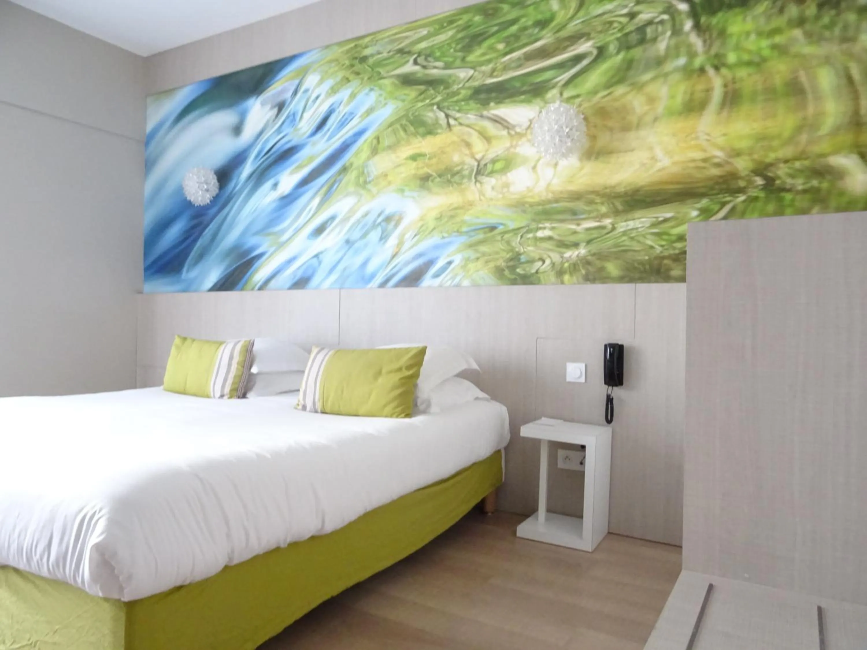 Bed in SOWELL HOTELS Domaine de la Petite Isle