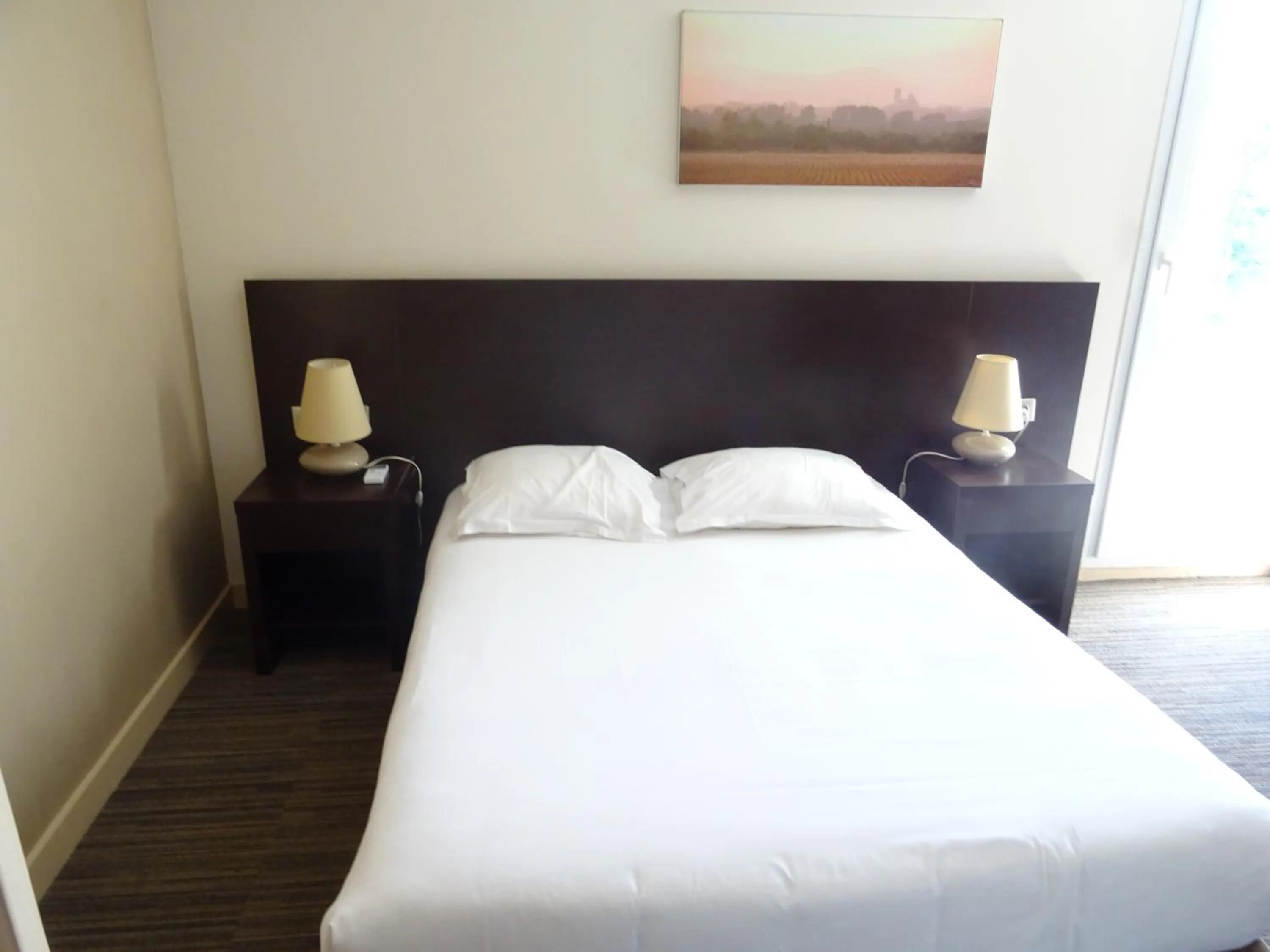 Bed in SOWELL HOTELS Domaine de la Petite Isle