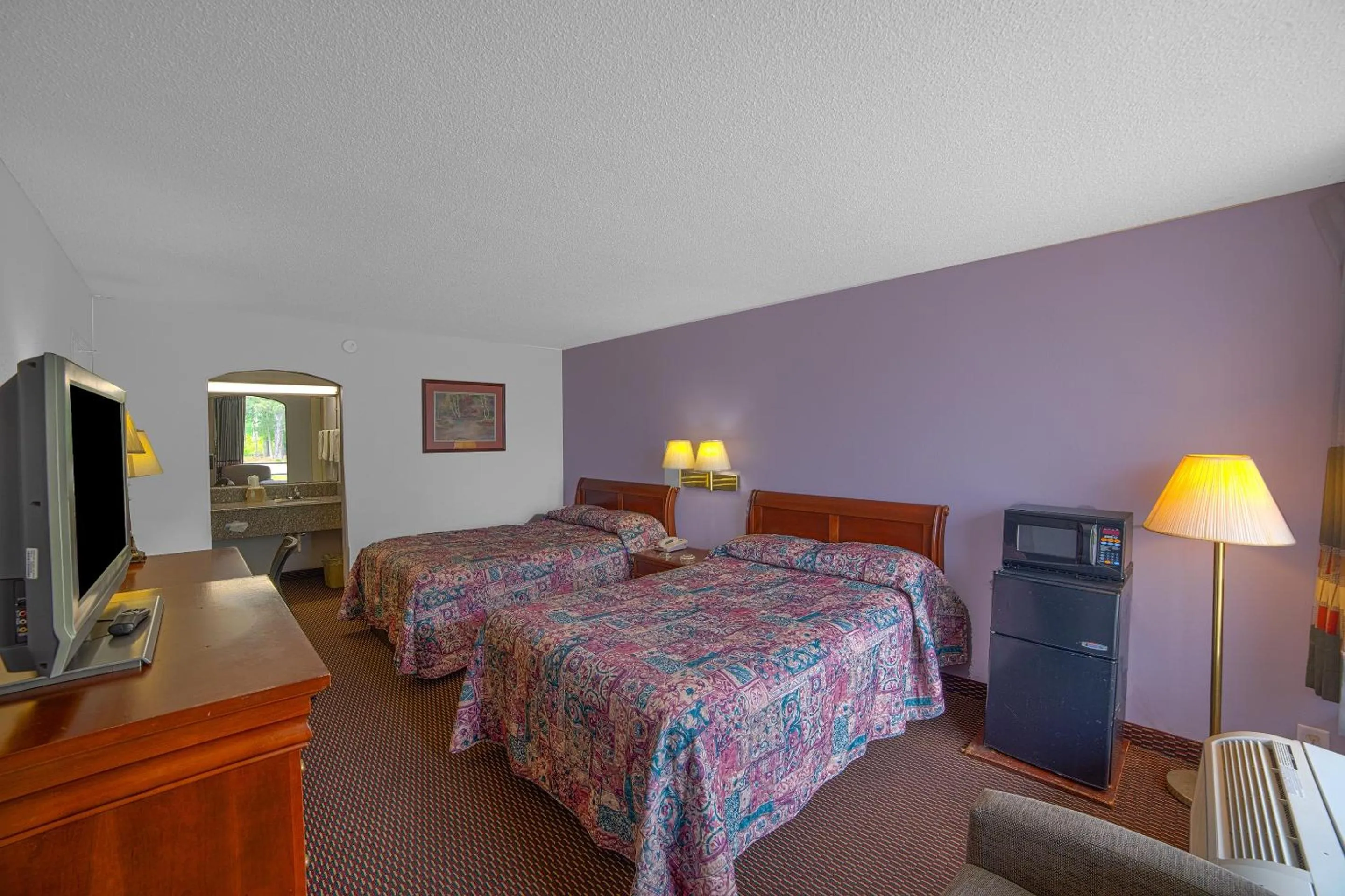 Bedroom, Bed in Masters Inn Selma Smithfield I-95 By OYO