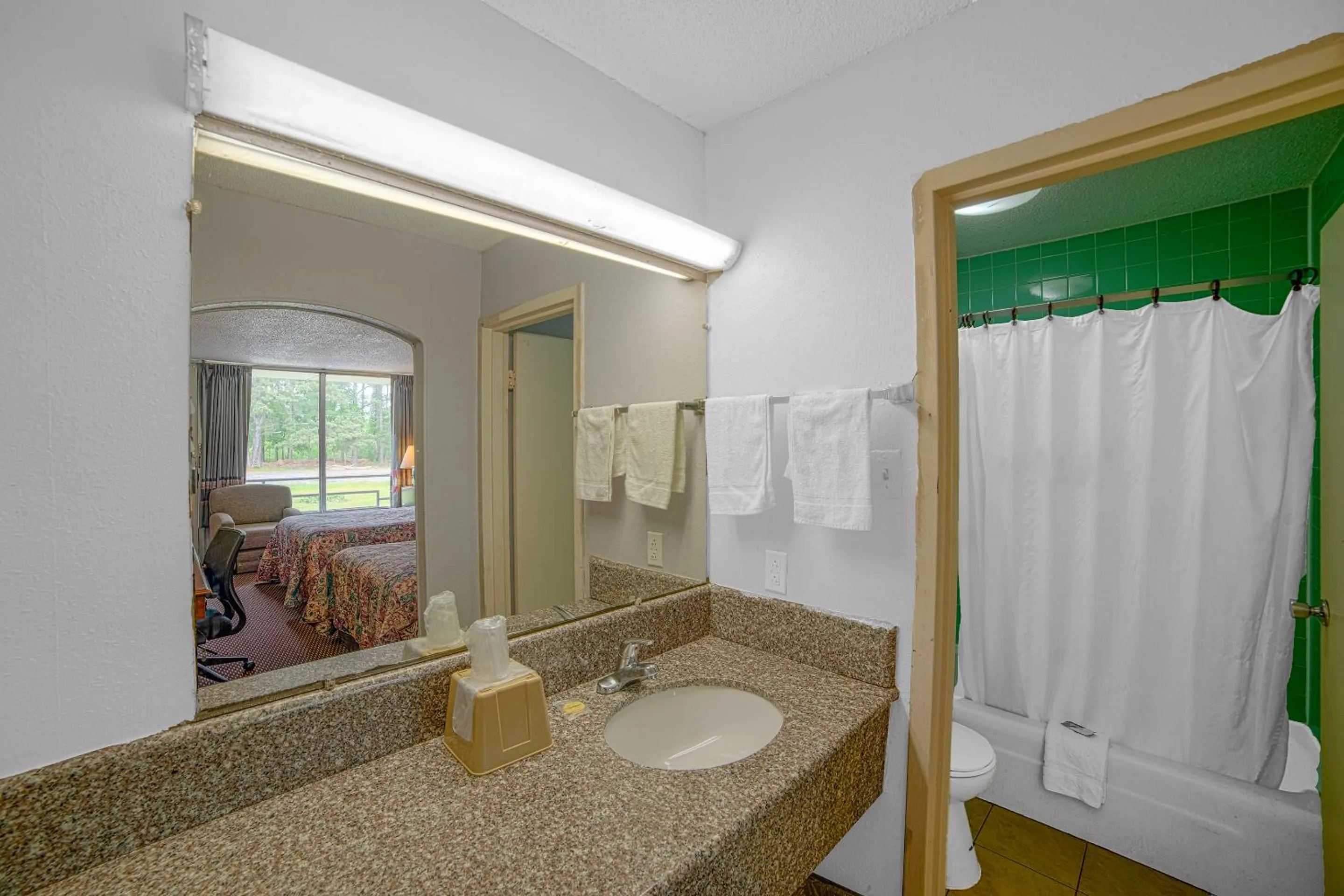 Bathroom in Masters Inn Selma Smithfield I-95 By OYO