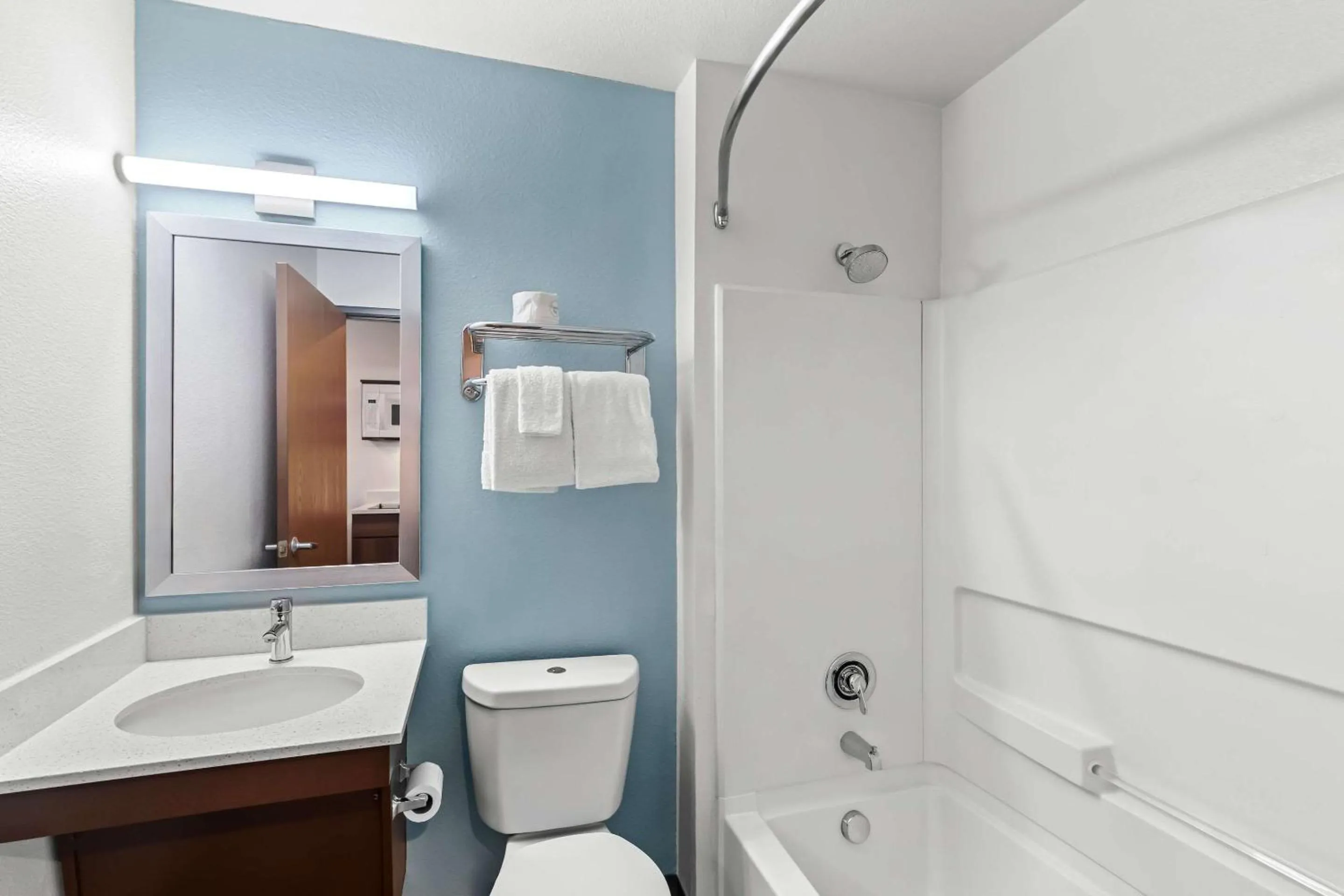 Bedroom in WoodSpring Suites Austin North I-35