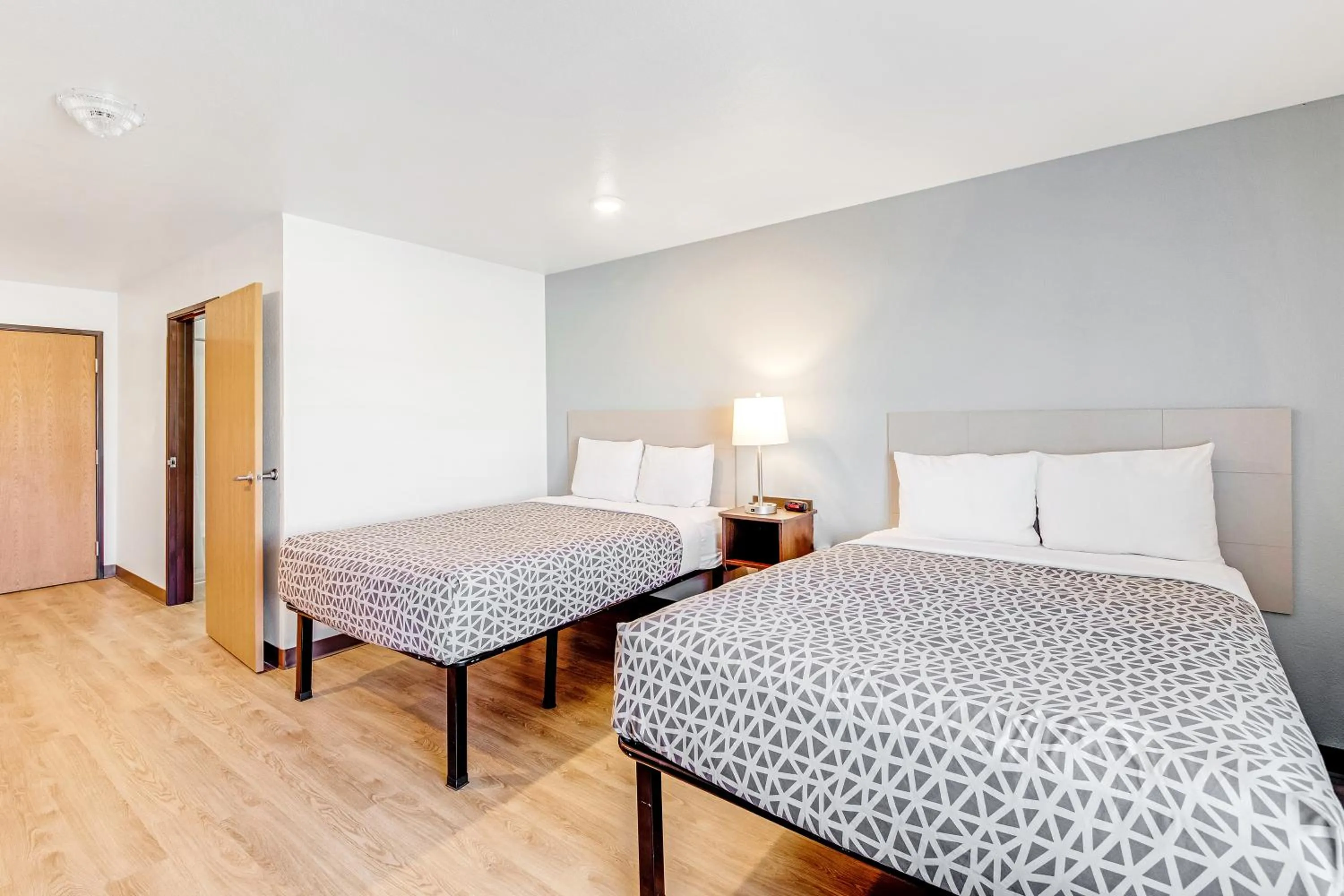 Bedroom, Bed in WoodSpring Suites Austin North I-35