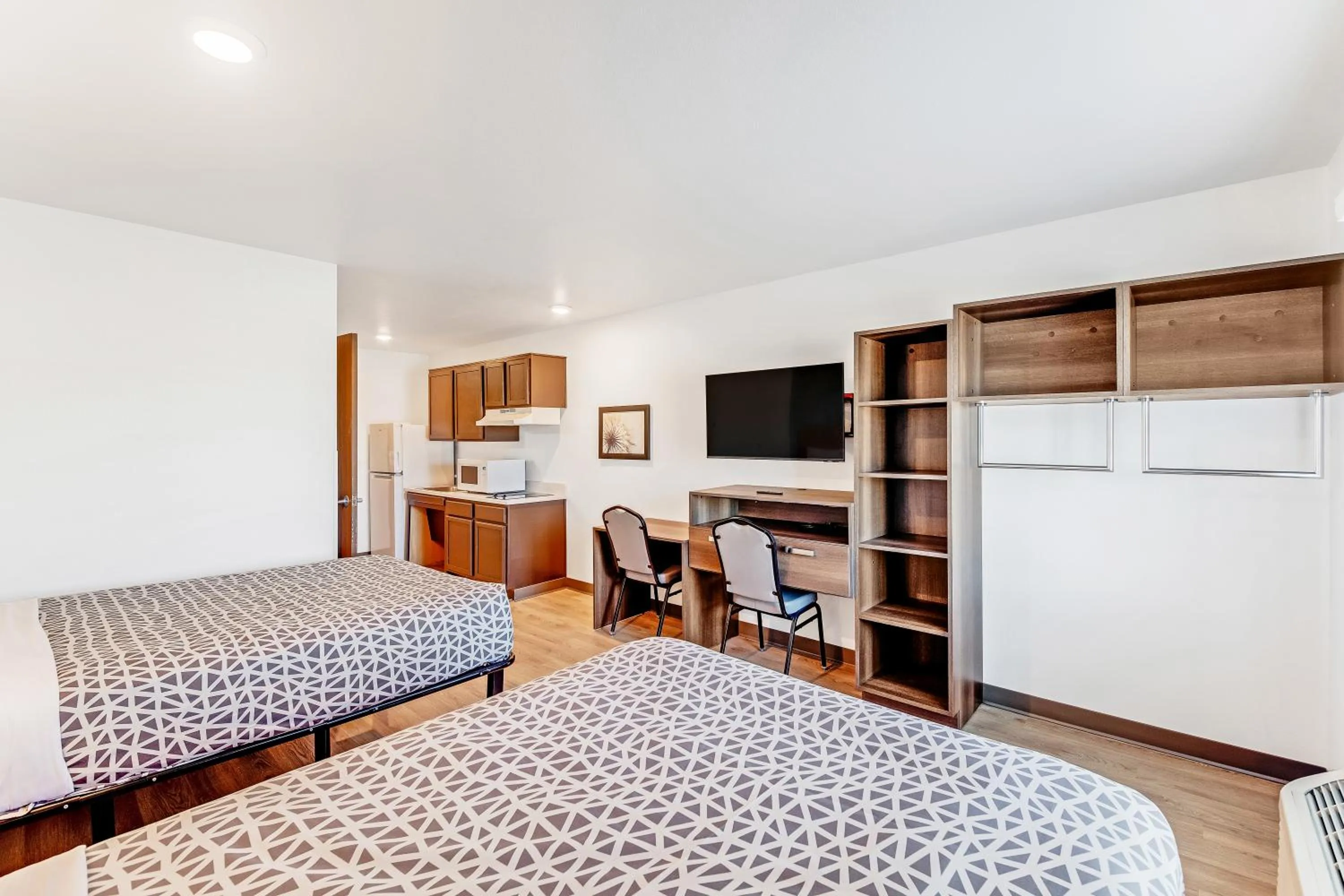 Photo of the whole room, Bed in WoodSpring Suites Austin North I-35