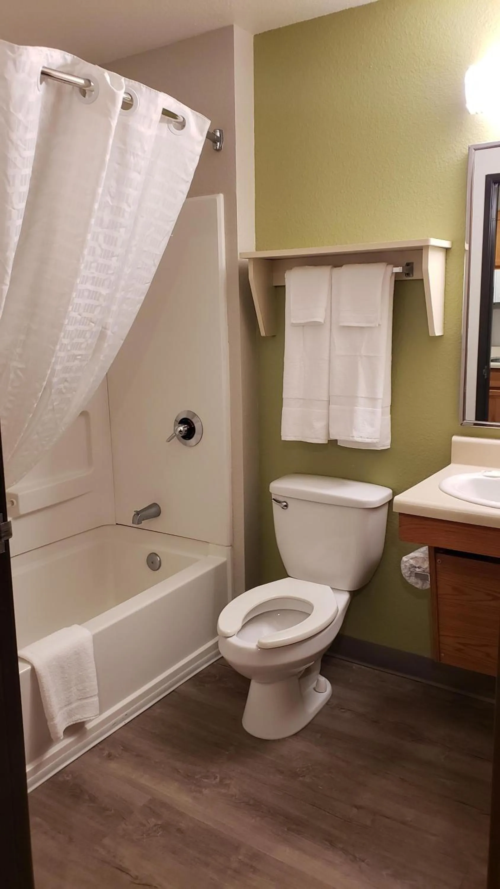 Shower in WoodSpring Suites Kansas City Lenexa