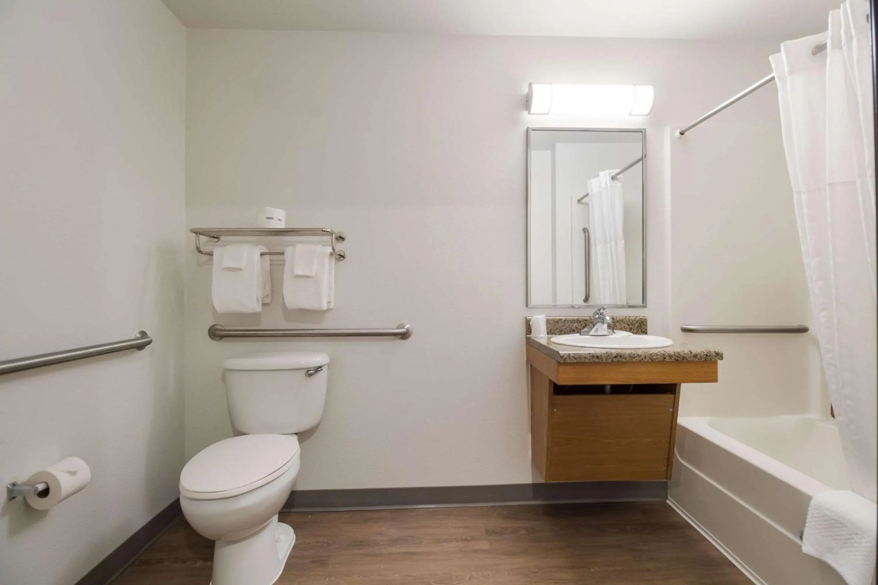 Bathroom in WoodSpring Suites Houston I-45 Airtex