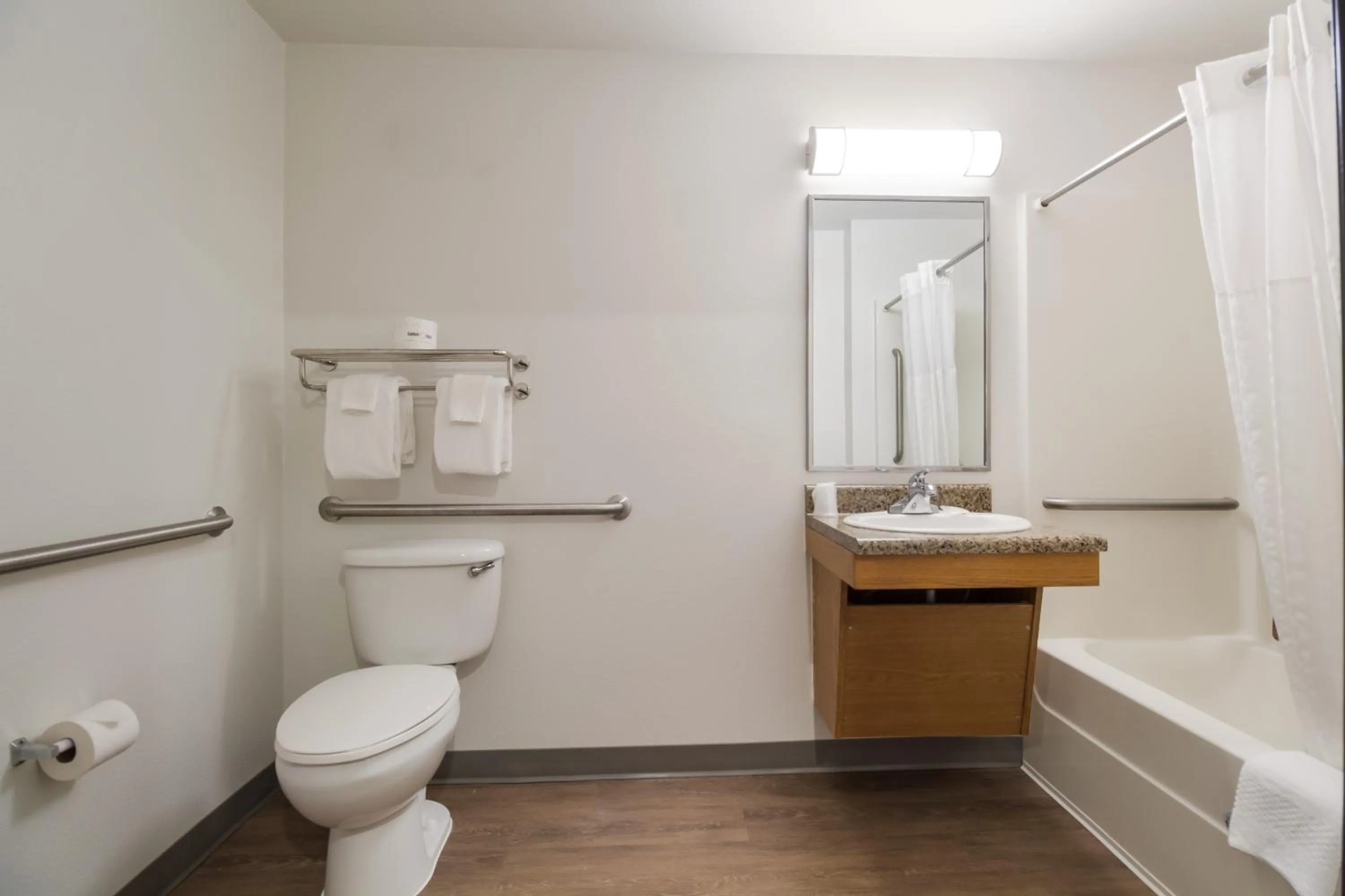 Bathroom in WoodSpring Suites Houston I-45 Airtex