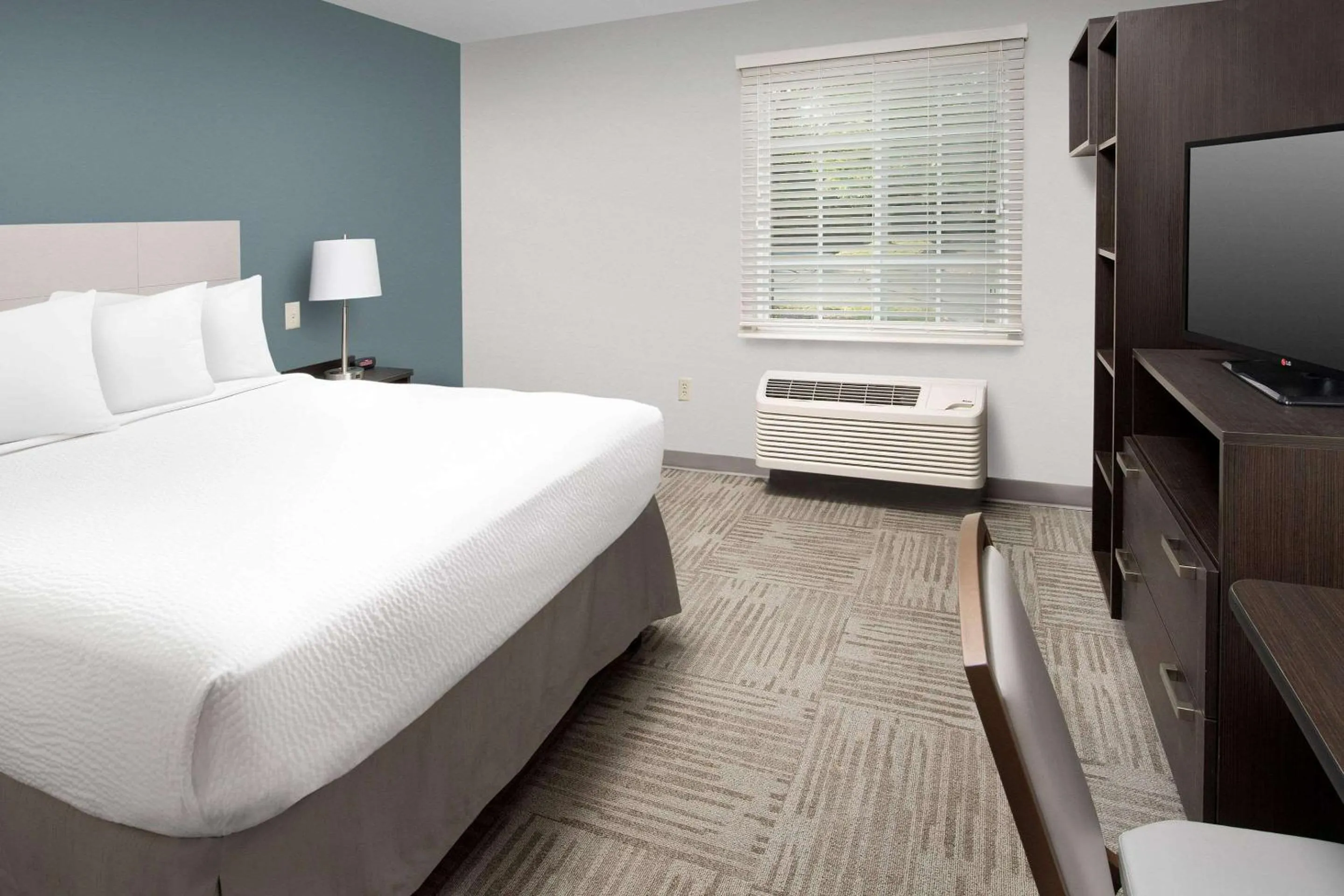 Photo of the whole room, Bed in WoodSpring Suites Murfreesboro