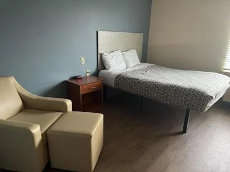 Bedroom, Bed in WoodSpring Suites St Louis St Charles