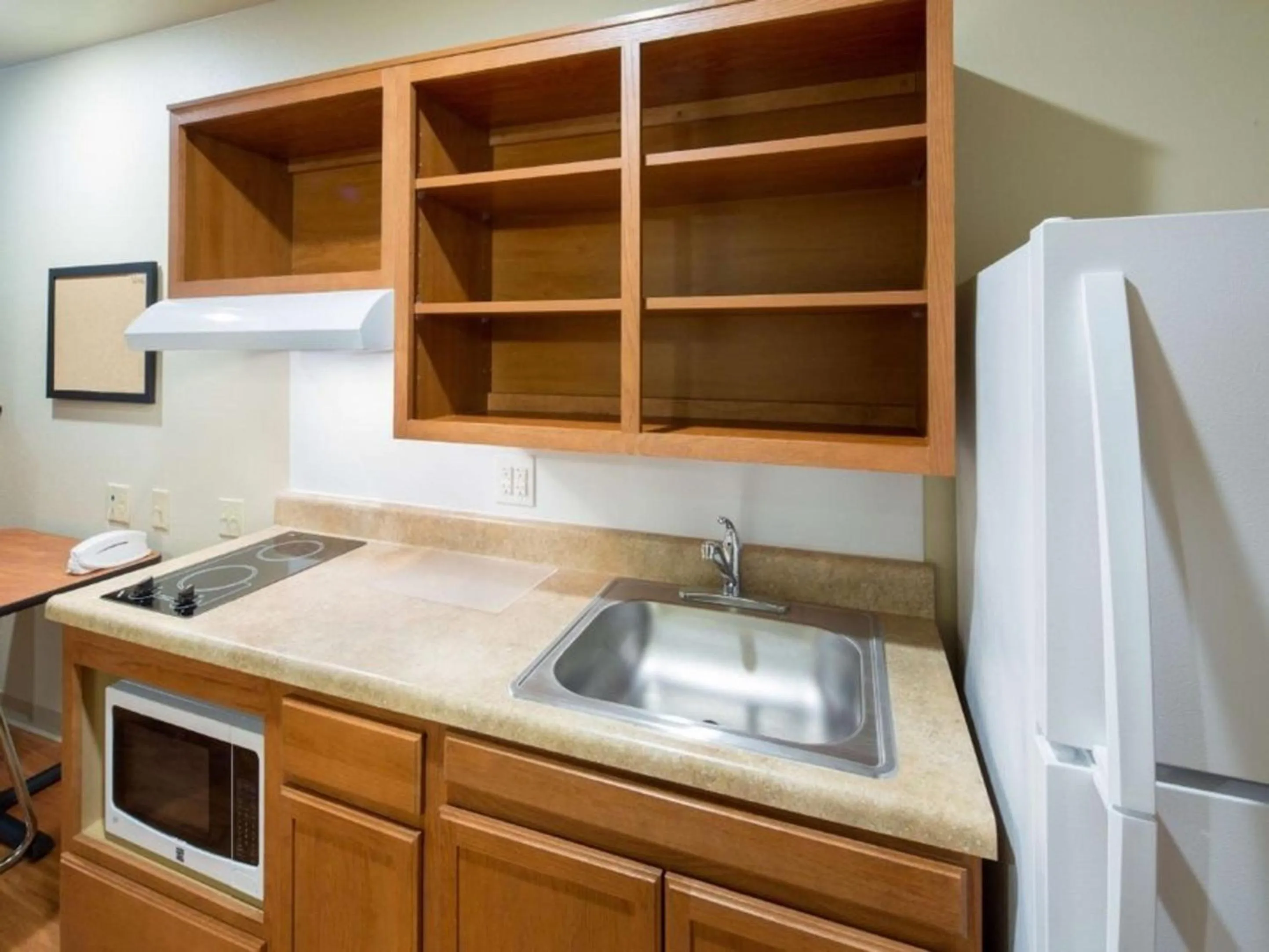 Kitchen or kitchenette in WoodSpring Suites McKinney