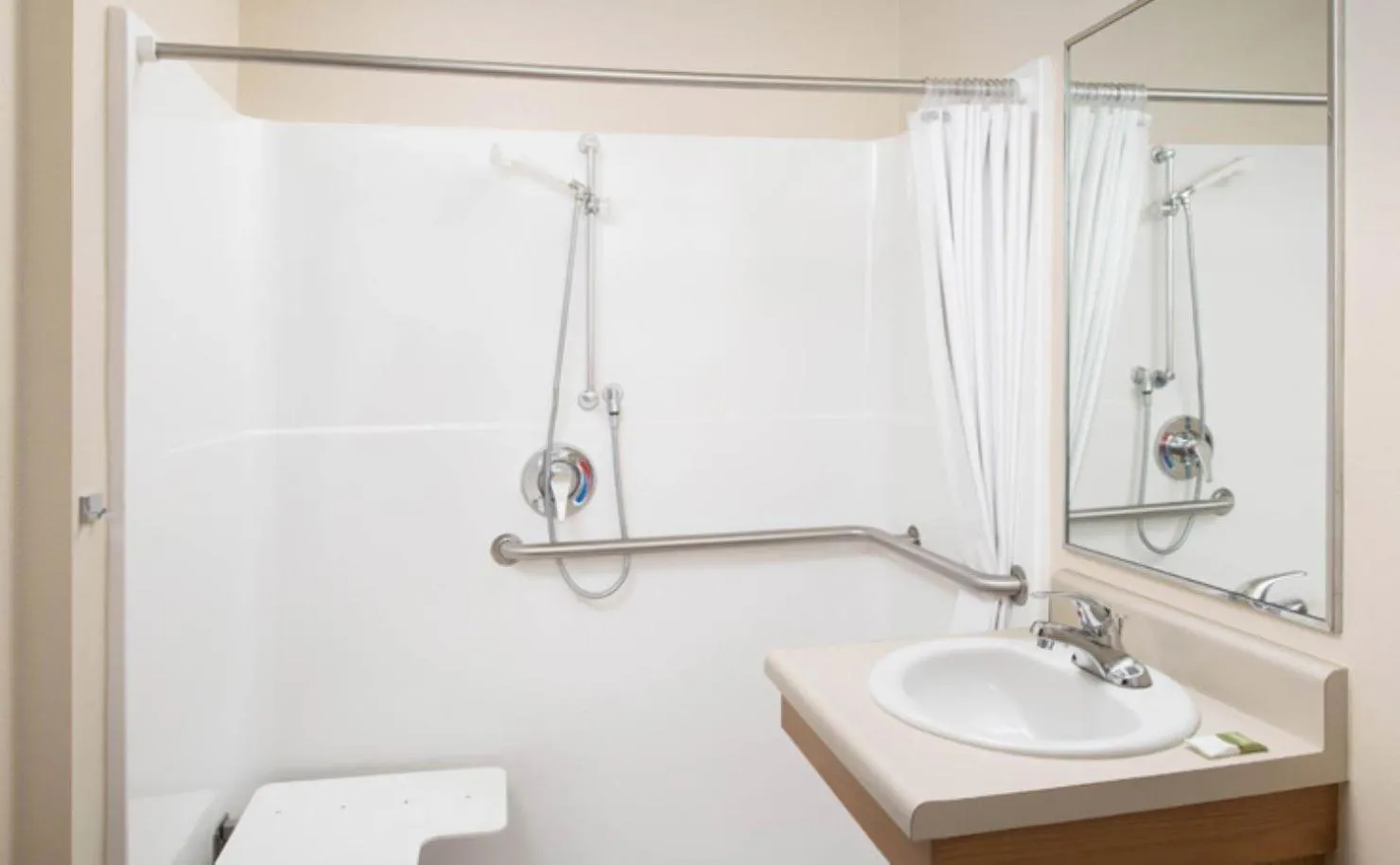 Bathroom in WoodSpring Suites Tulsa