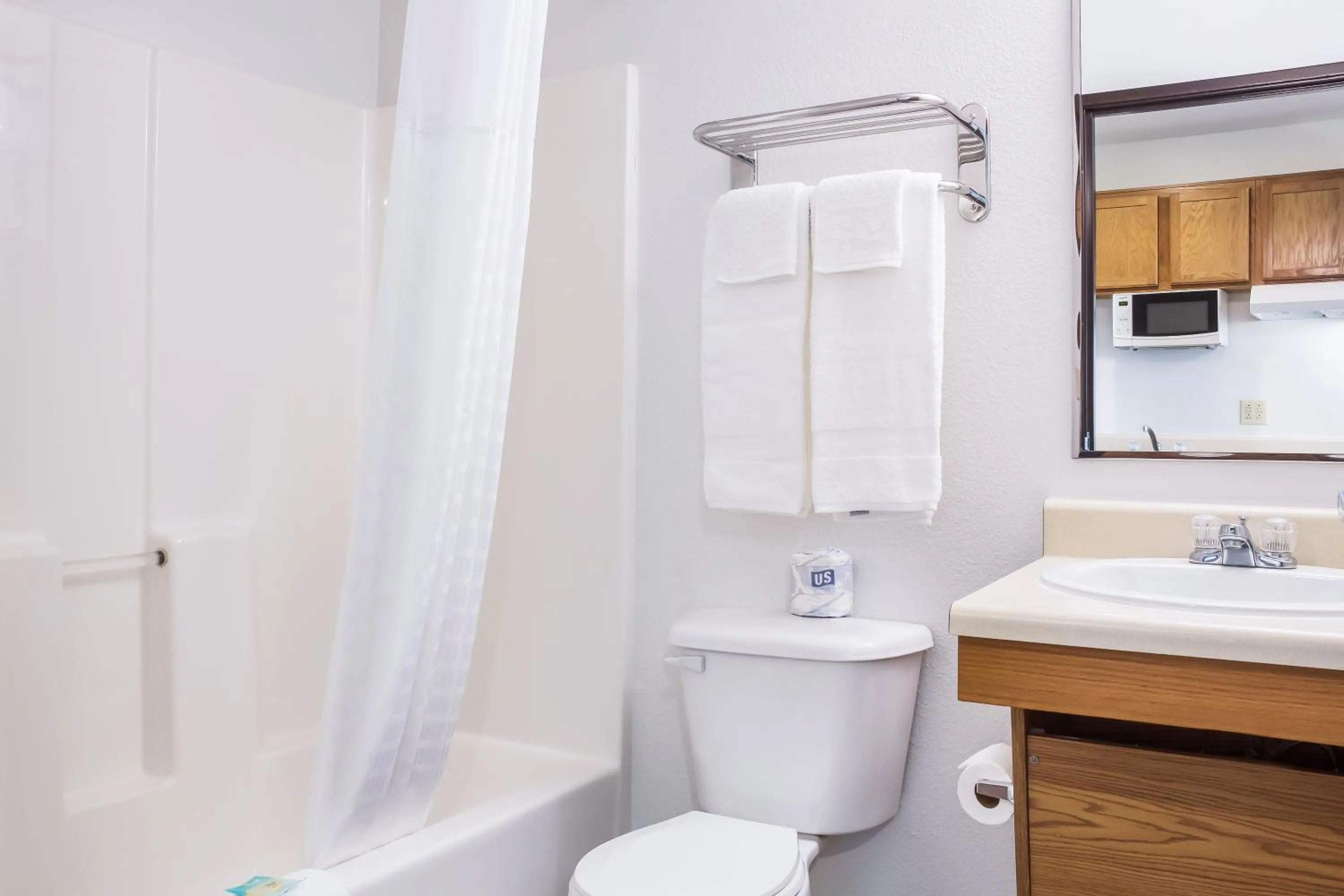 Bathroom in WoodSpring Suites Denton