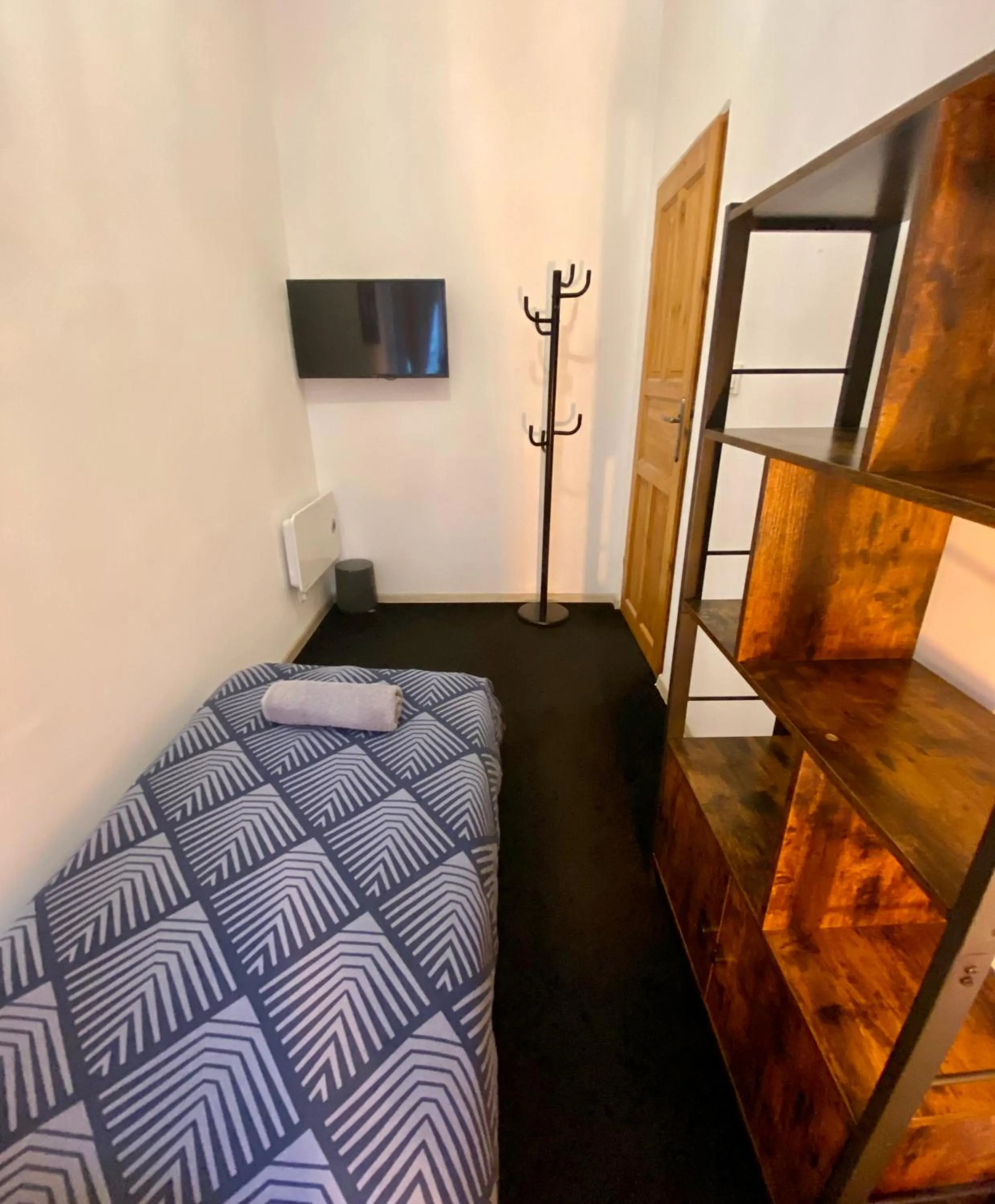 Bed in Topolove Rooms & Apartments