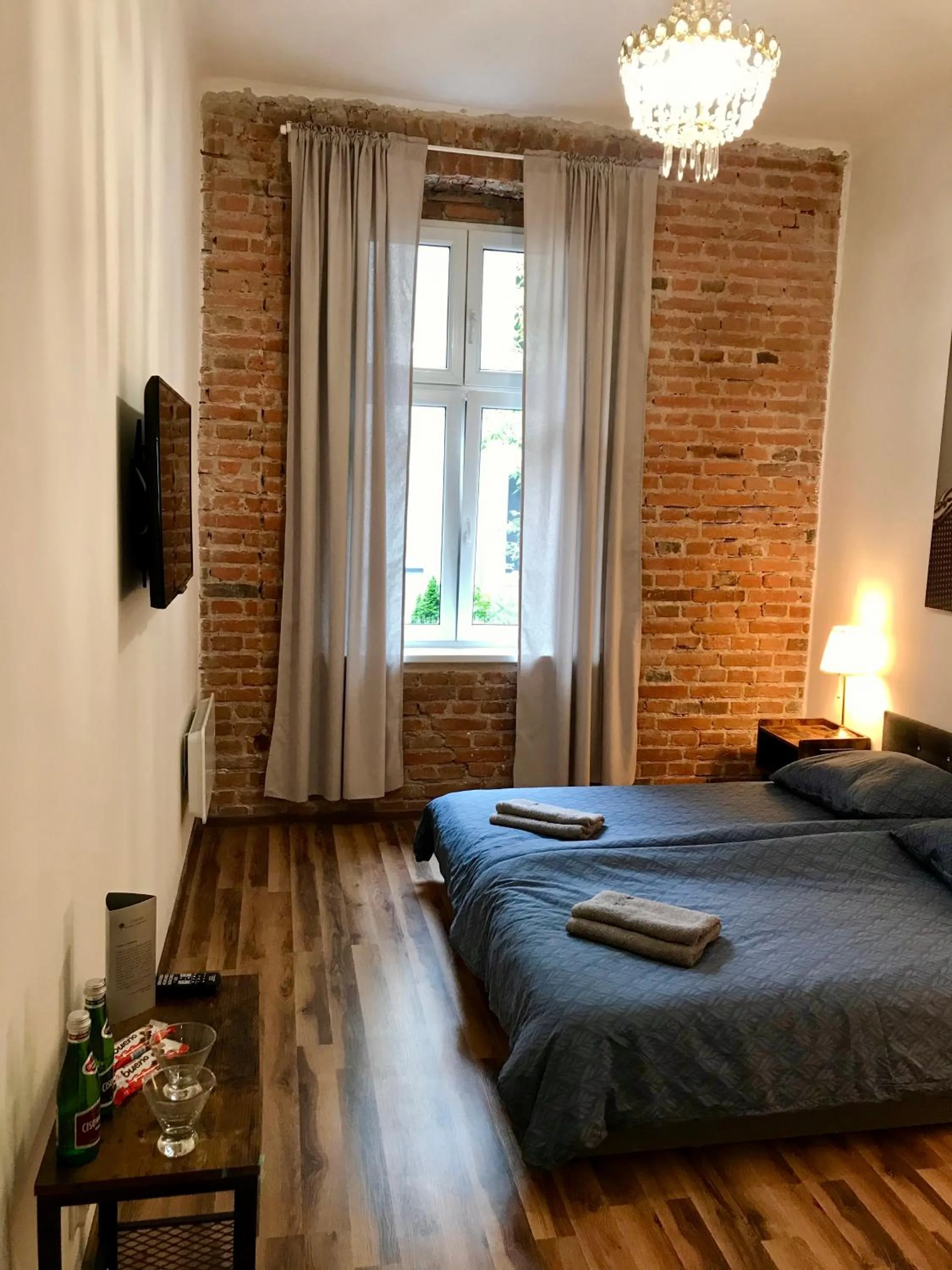 Bed in Topolove Rooms & Apartments