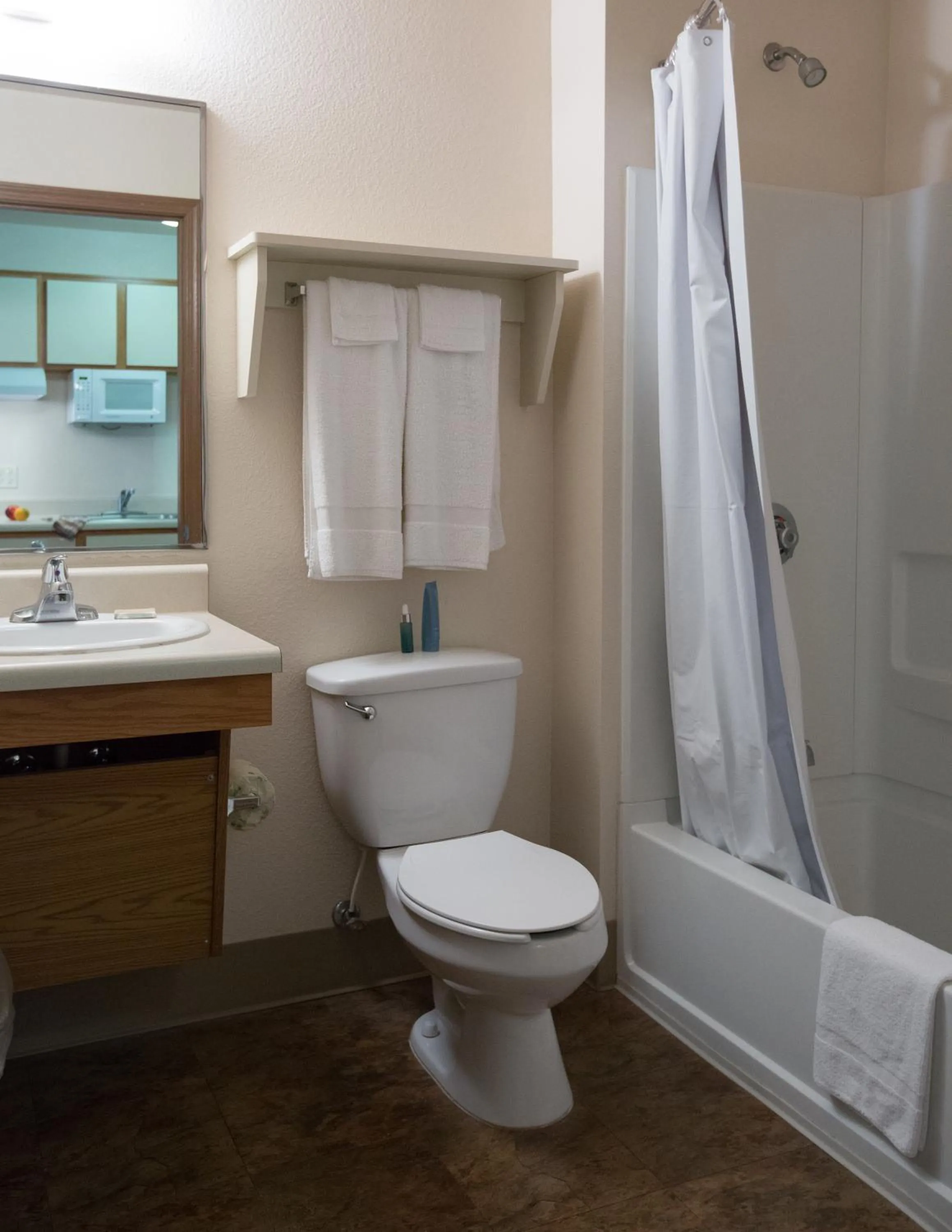 Bathroom in WoodSpring Suites Kansas City Mission