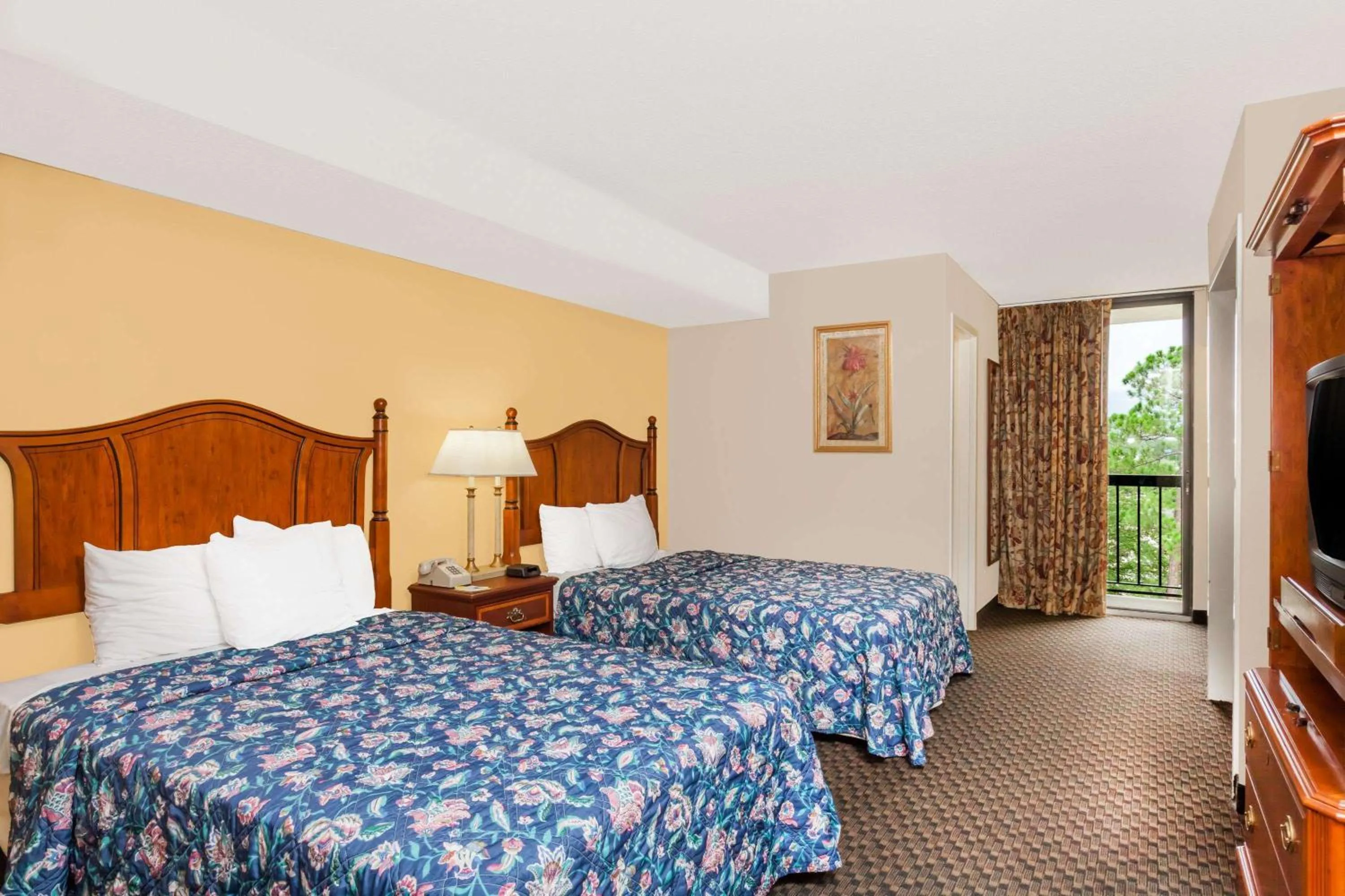 Photo of the whole room in Days Inn & Suites by Wyndham SE Columbia Ft Jackson