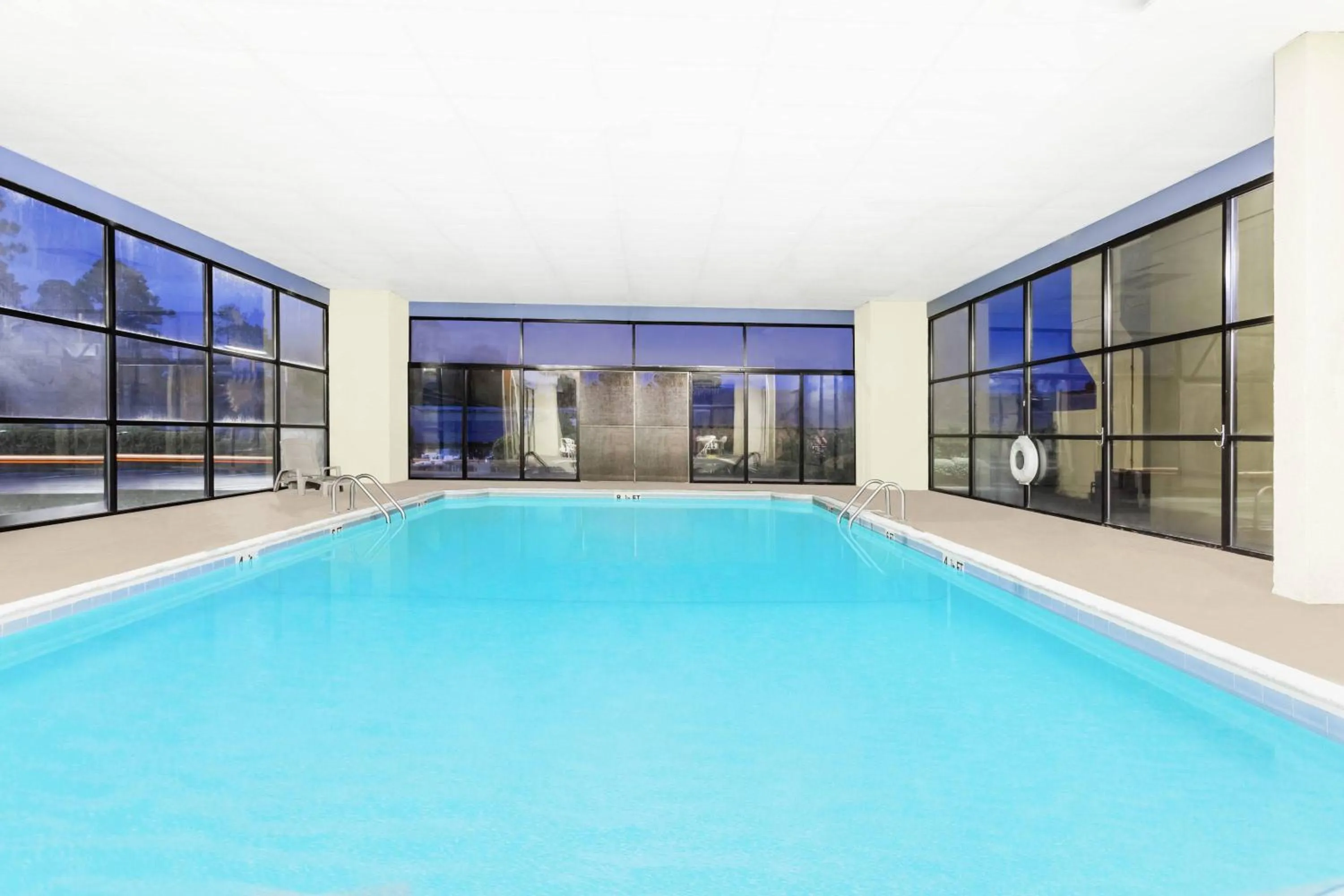 Swimming Pool in Days Inn & Suites by Wyndham SE Columbia Ft Jackson