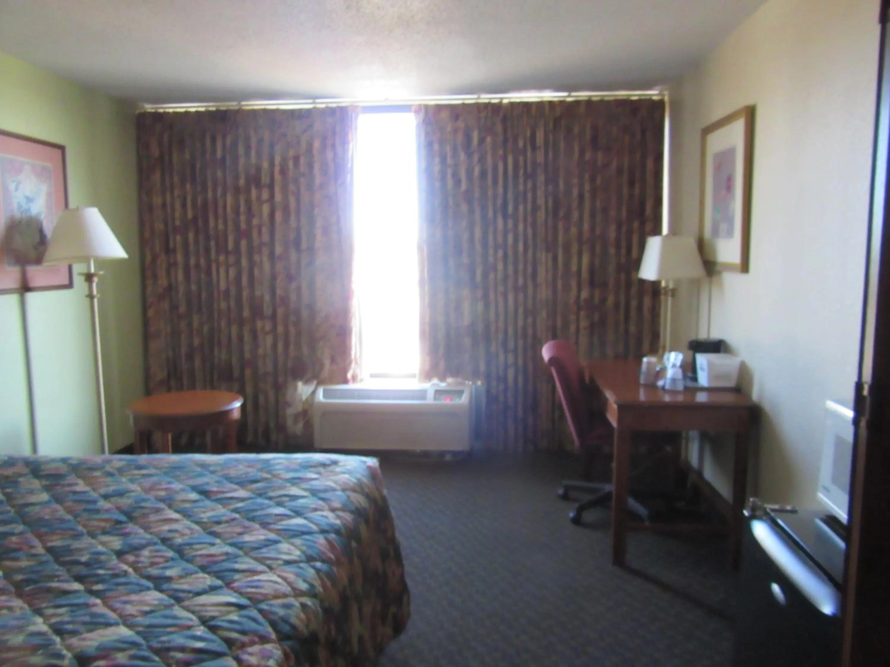 Day, TV/Entertainment Center in Days Inn & Suites by Wyndham SE Columbia Ft Jackson
