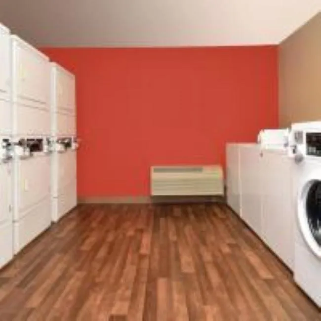 washing machine in MainStay Suites Chicago Hillside