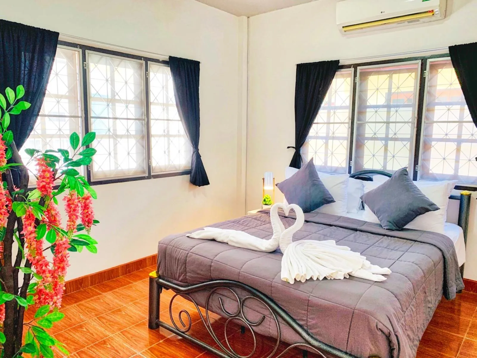 Bed in Thai Orange Villas