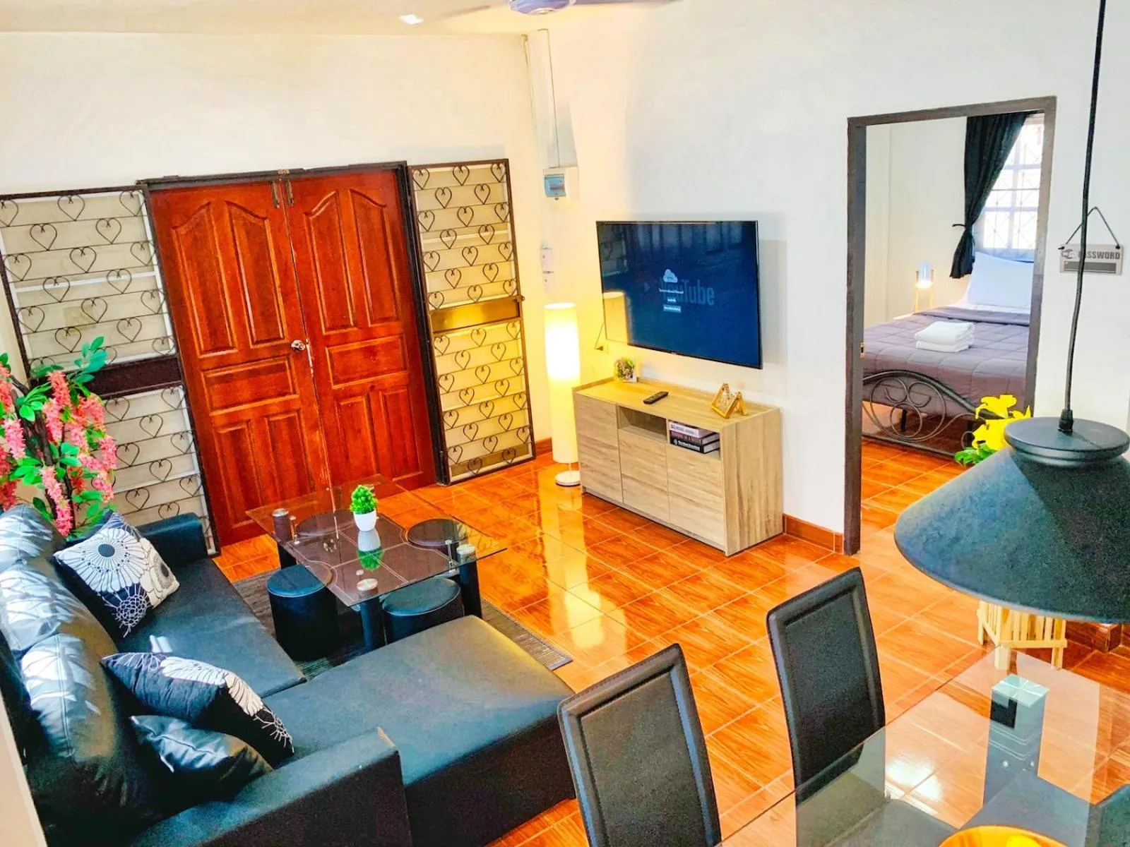 Communal lounge/ TV room, Bed in Thai Orange Villas