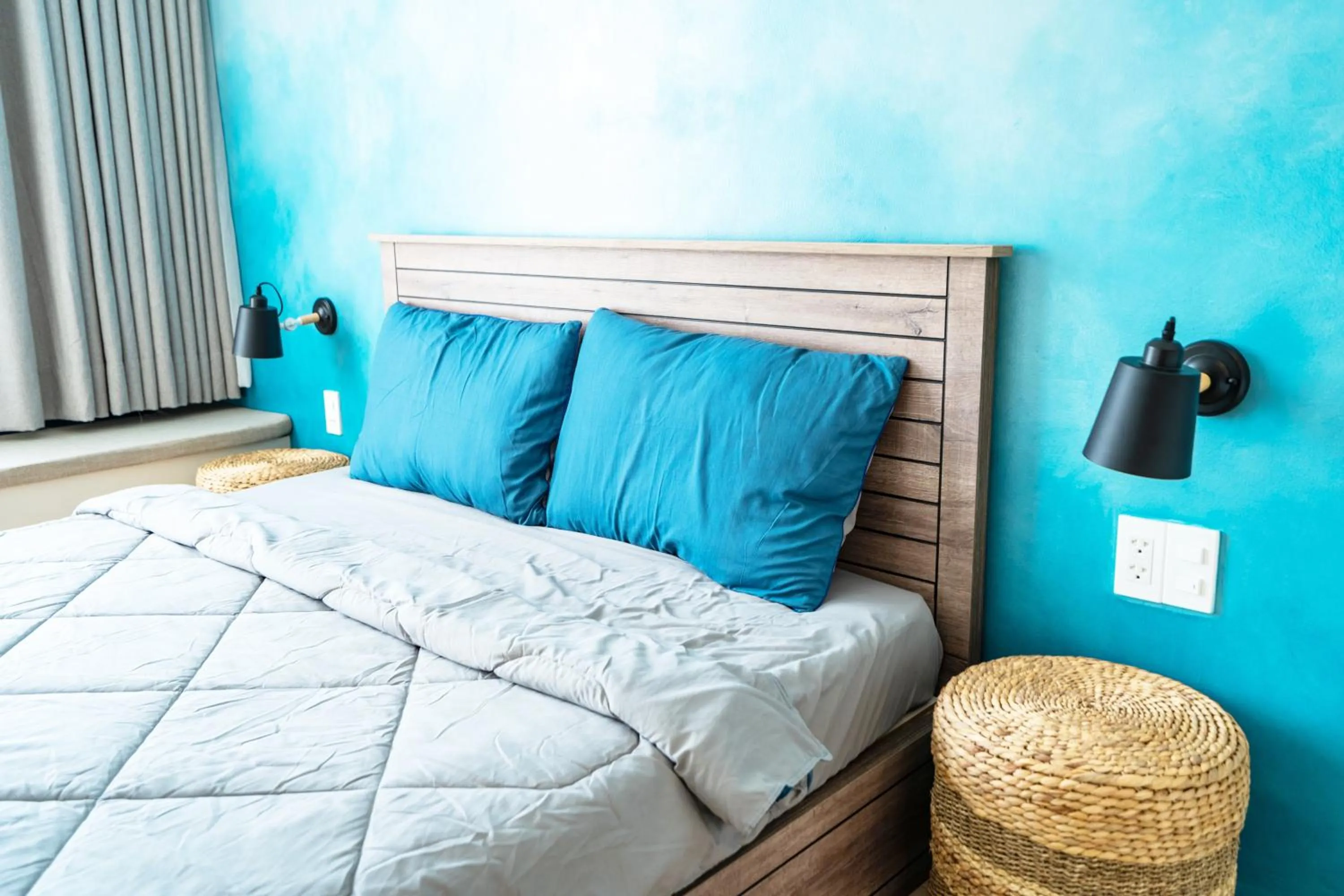 Bed in Mecozy Apartel