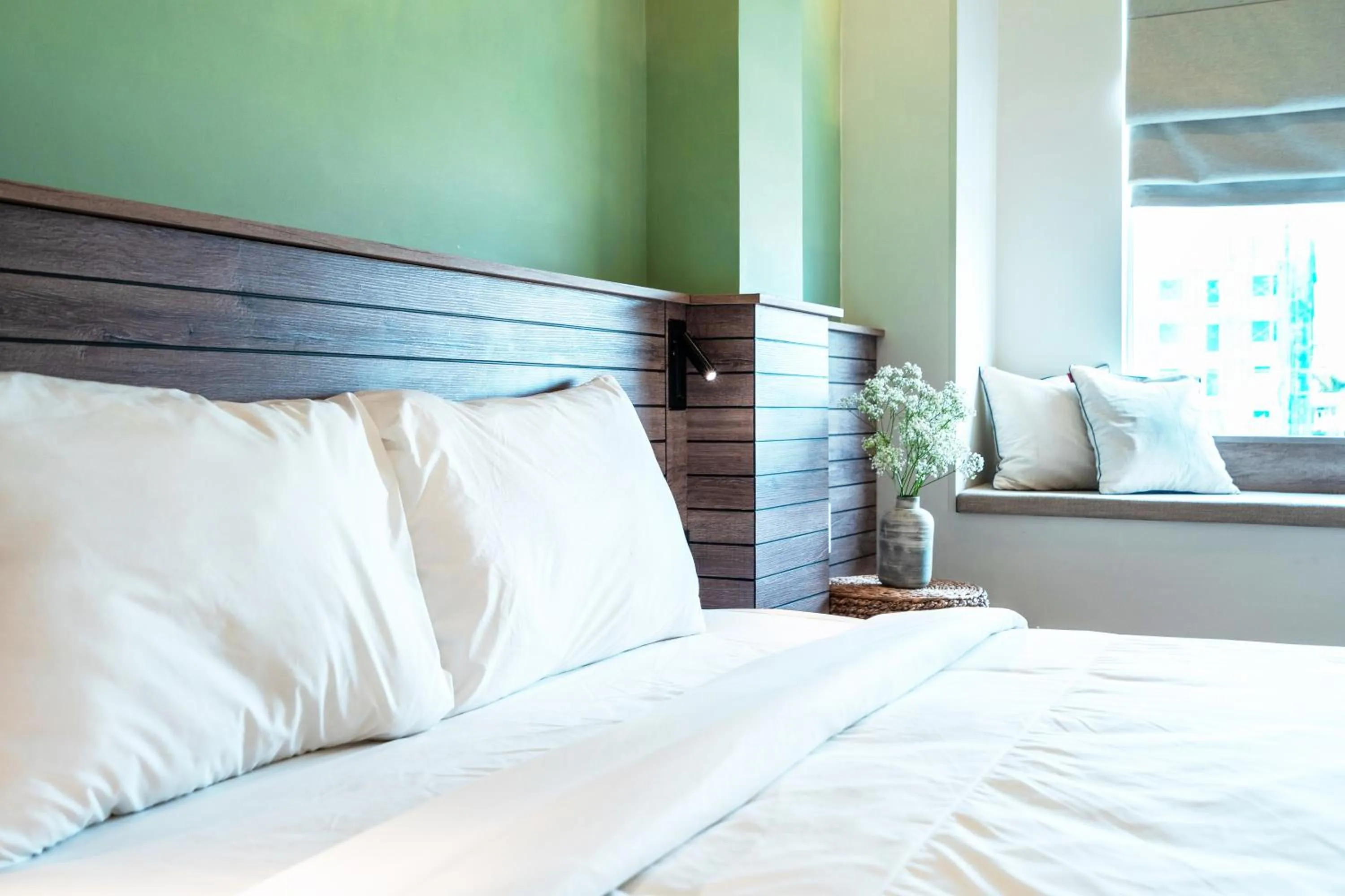 Bed in Mecozy Apartel