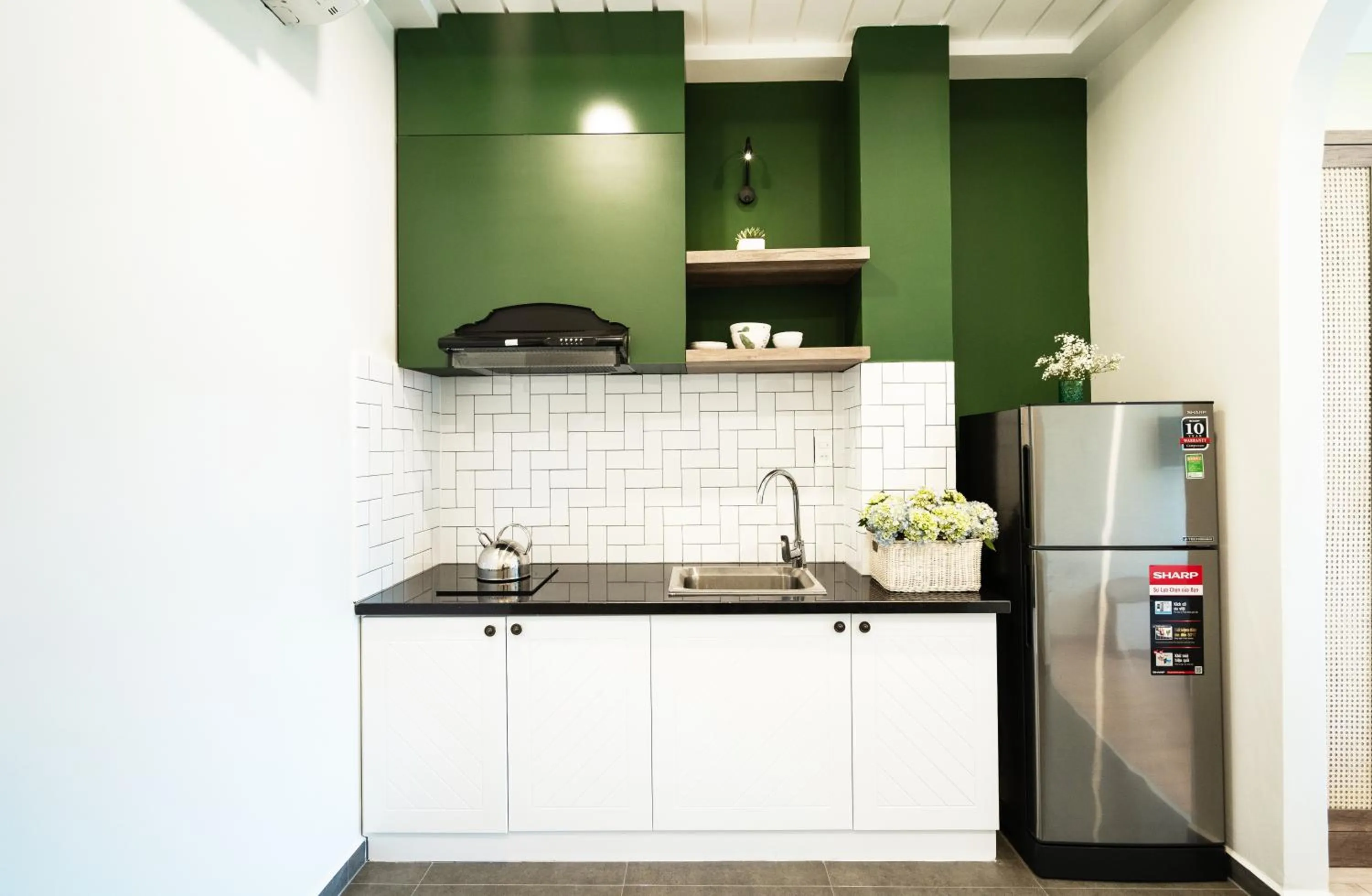 Kitchen or kitchenette in Mecozy Apartel