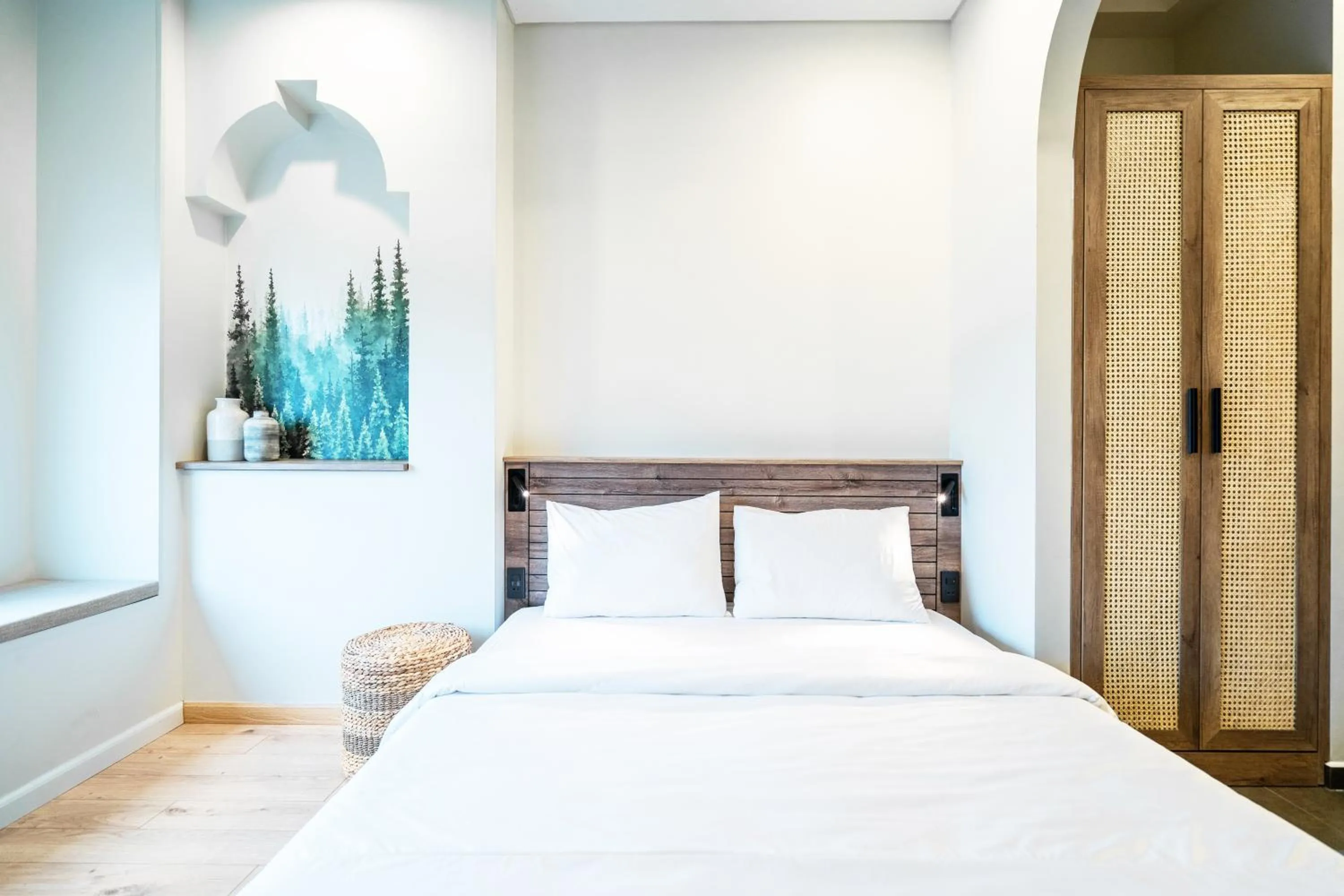 Bed in Mecozy Apartel