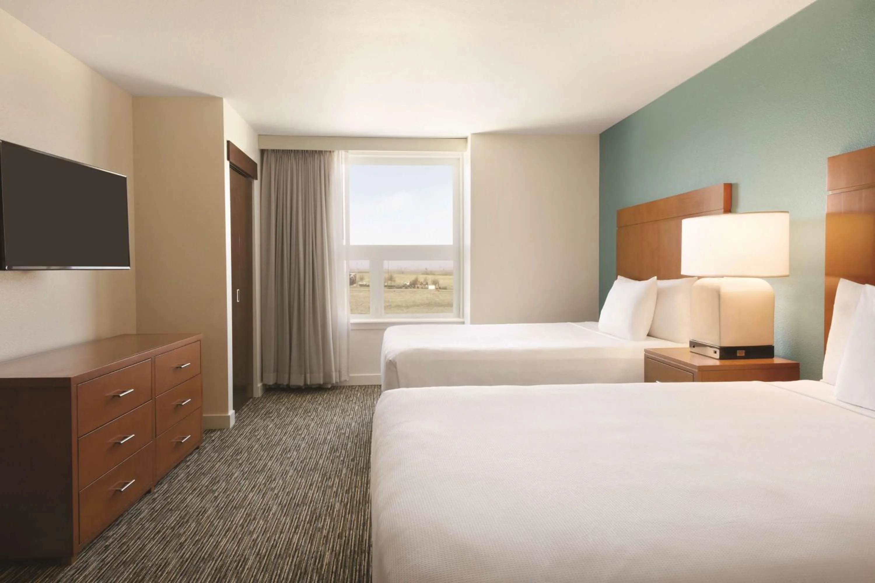 Photo of the whole room, Bed in Hyatt House Denver Airport