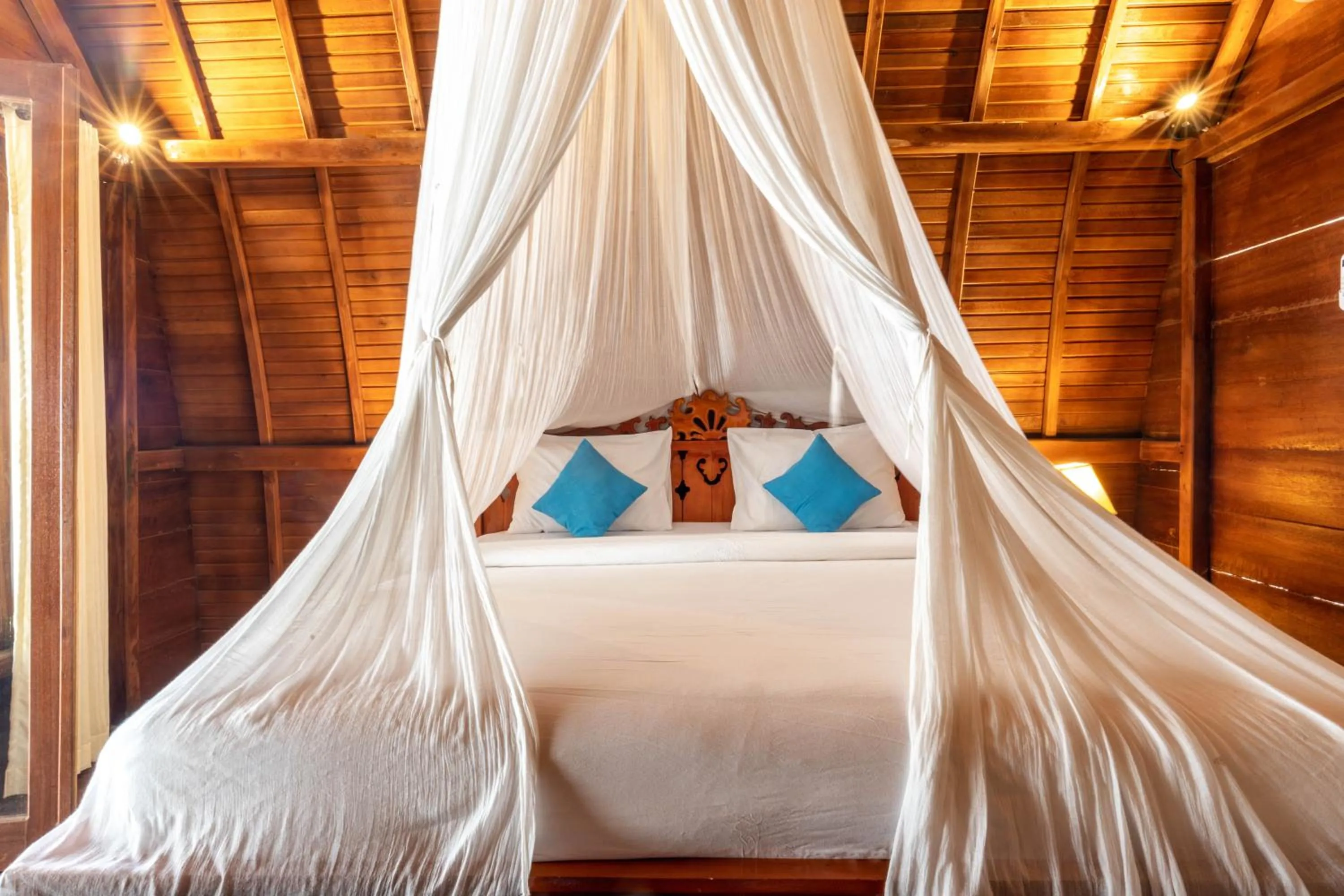 Bed in Sukawati Inn at Crystal Bay