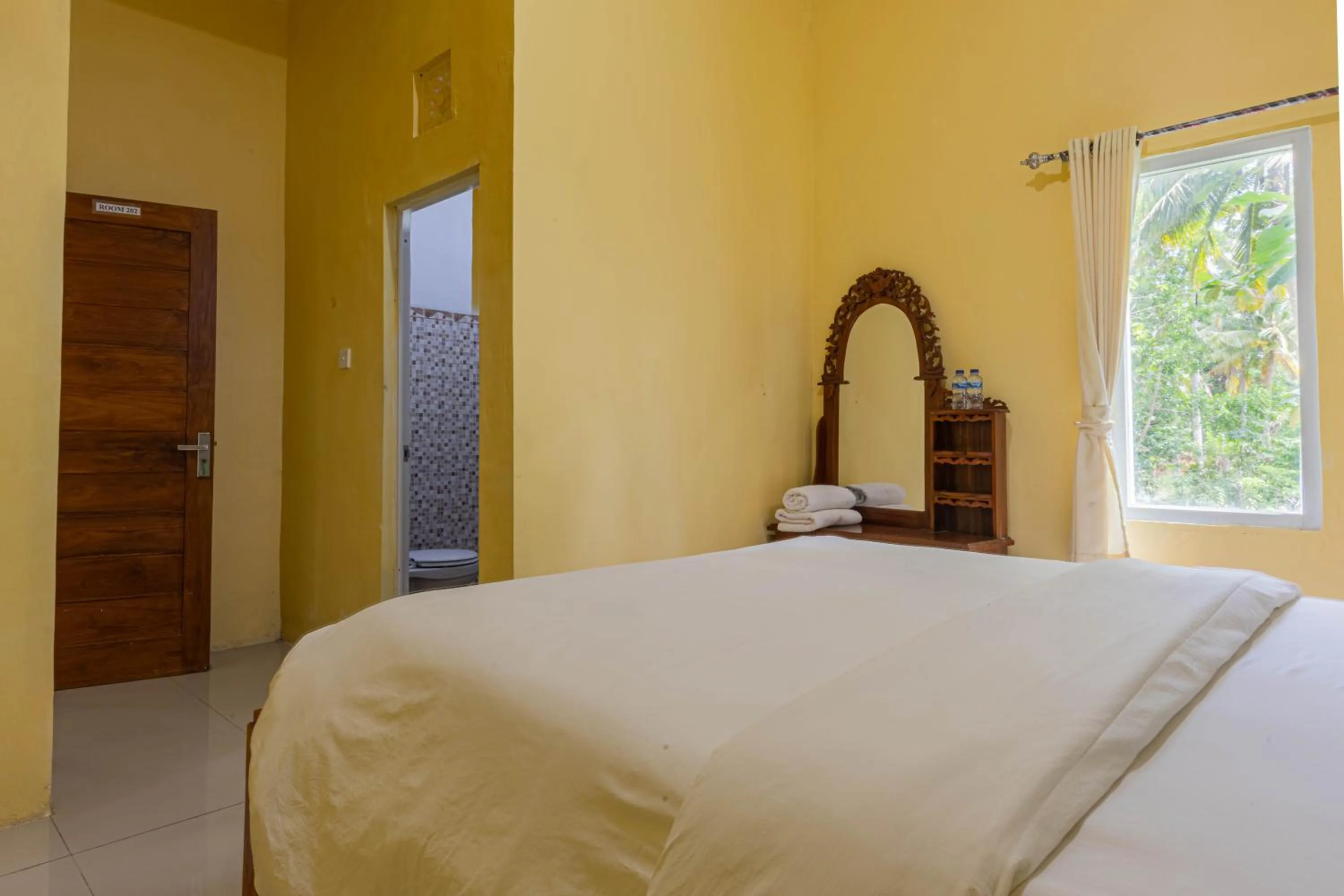 Bed in Sukawati Inn at Crystal Bay