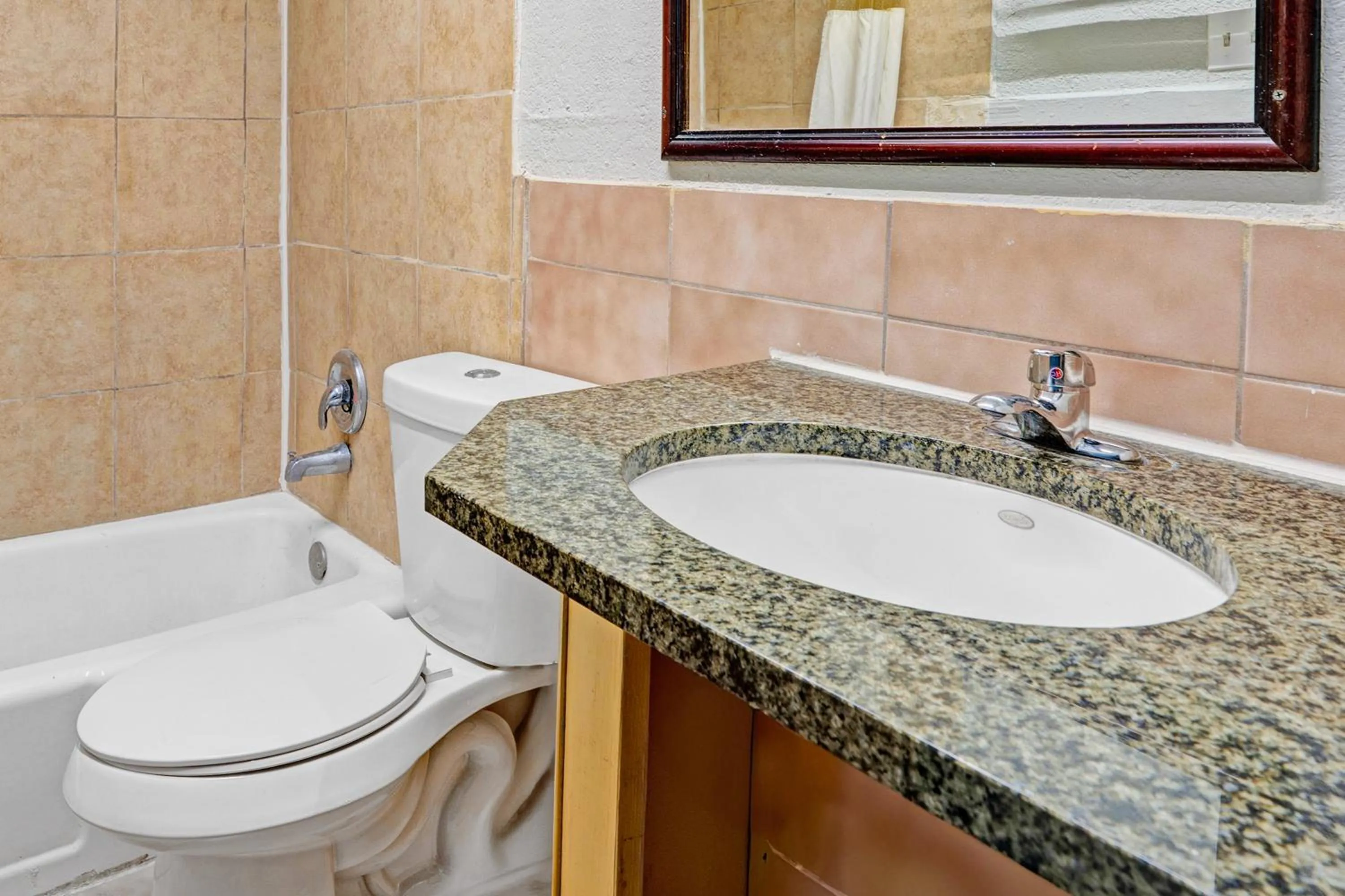 Bathroom in Super 7 Inn By OYO San Antonio NW Medical Center