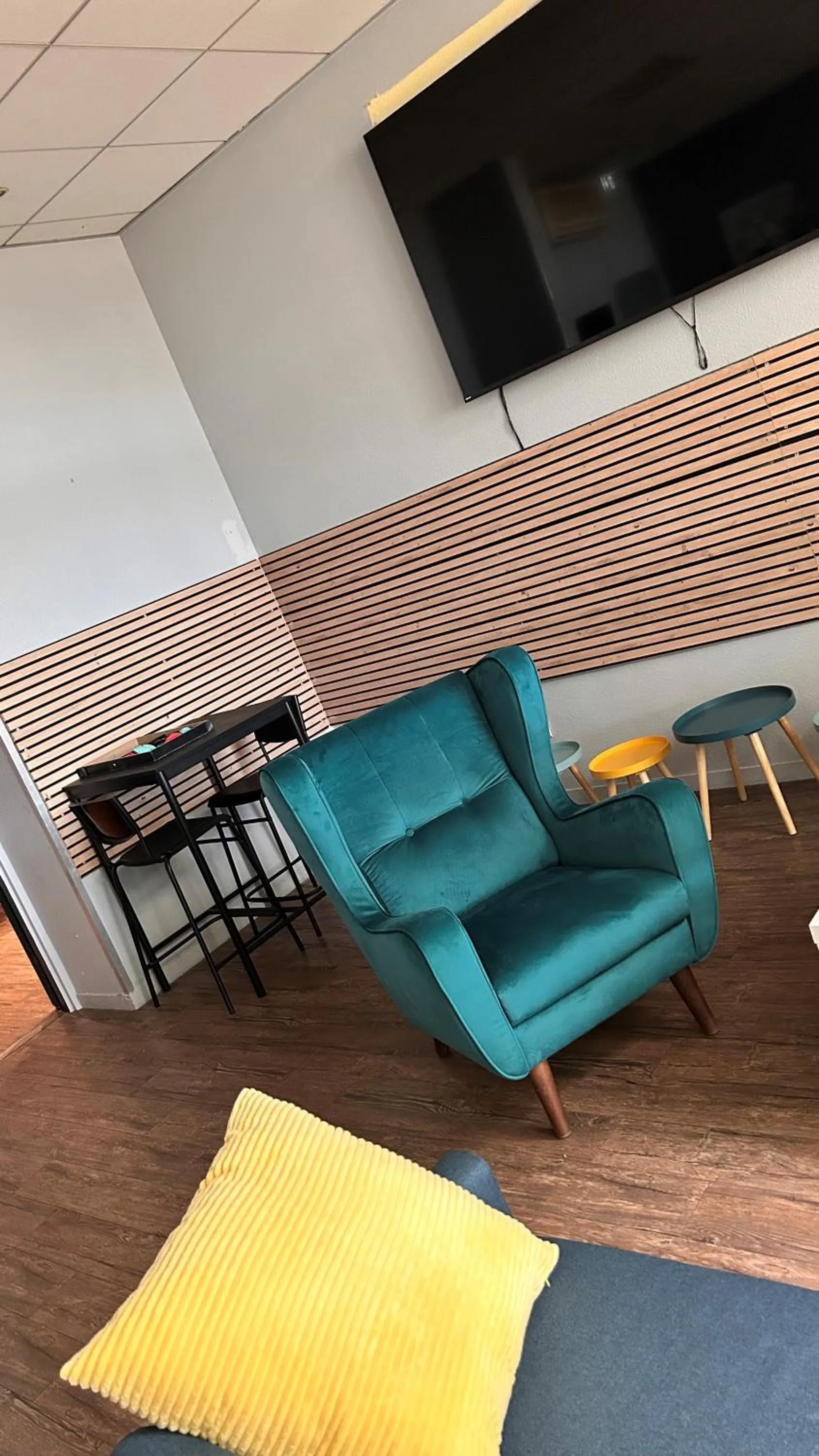 Communal lounge/ TV room in Kyriad Marne-La-Vallée Torcy