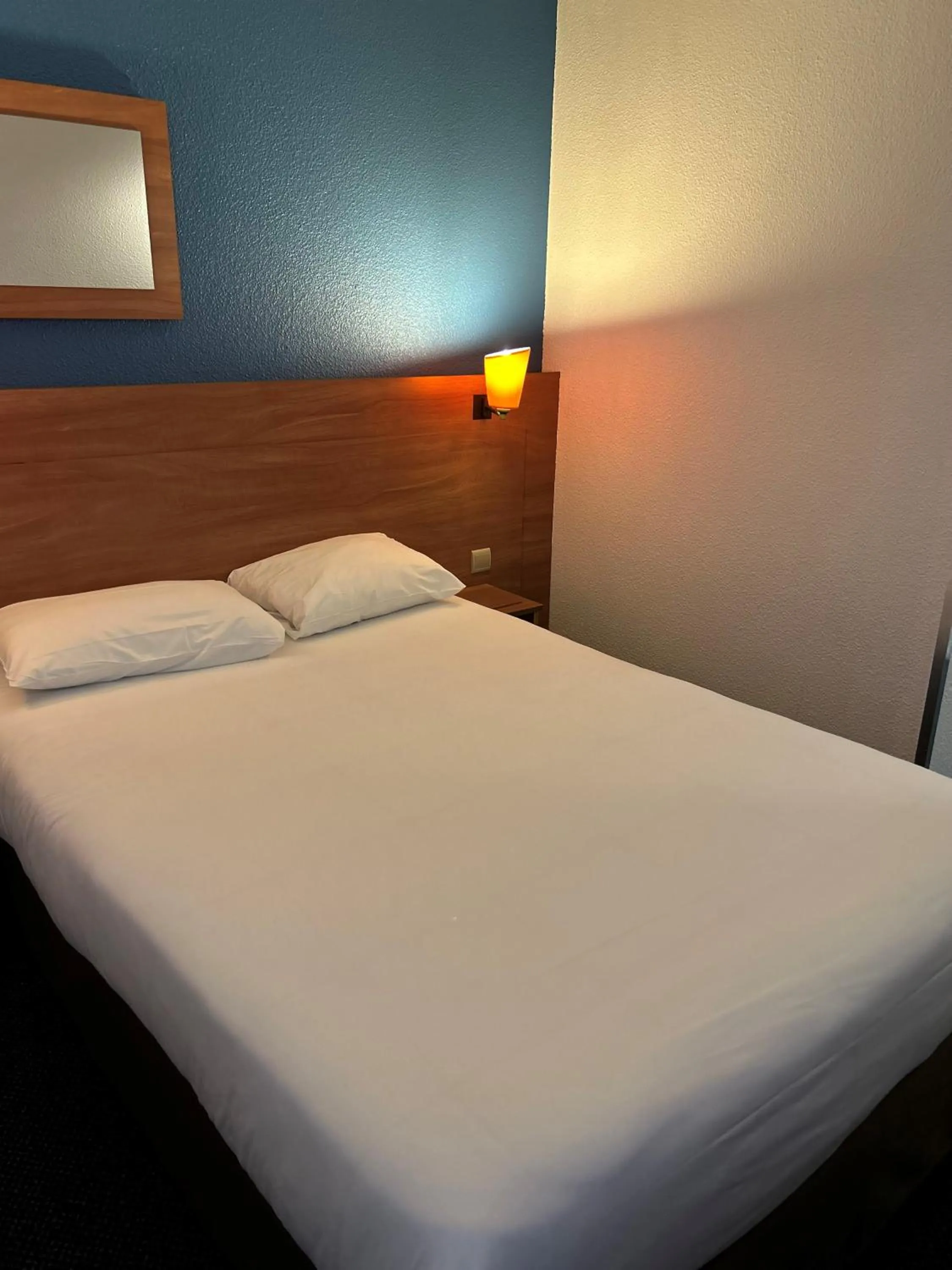 Bedroom, Bed in Kyriad Marne-La-Vallée Torcy