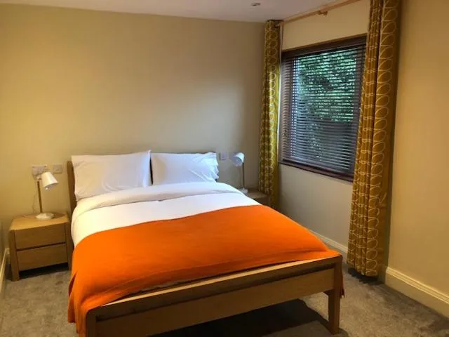 Bed in Newell Bistro and Rooms