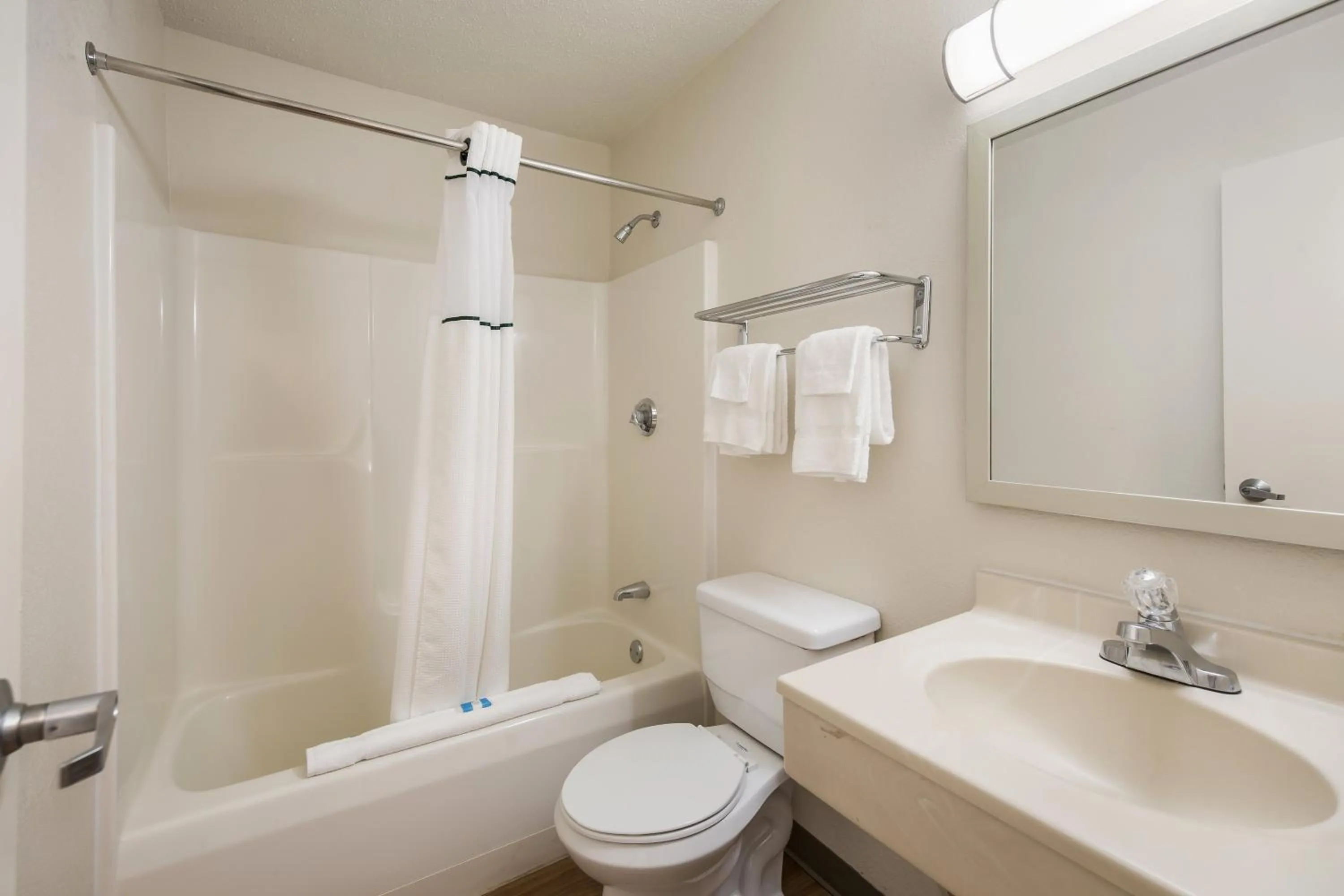 Bathroom in HomeTowne Studios by Red Roof Spartanburg - Asheville Highway