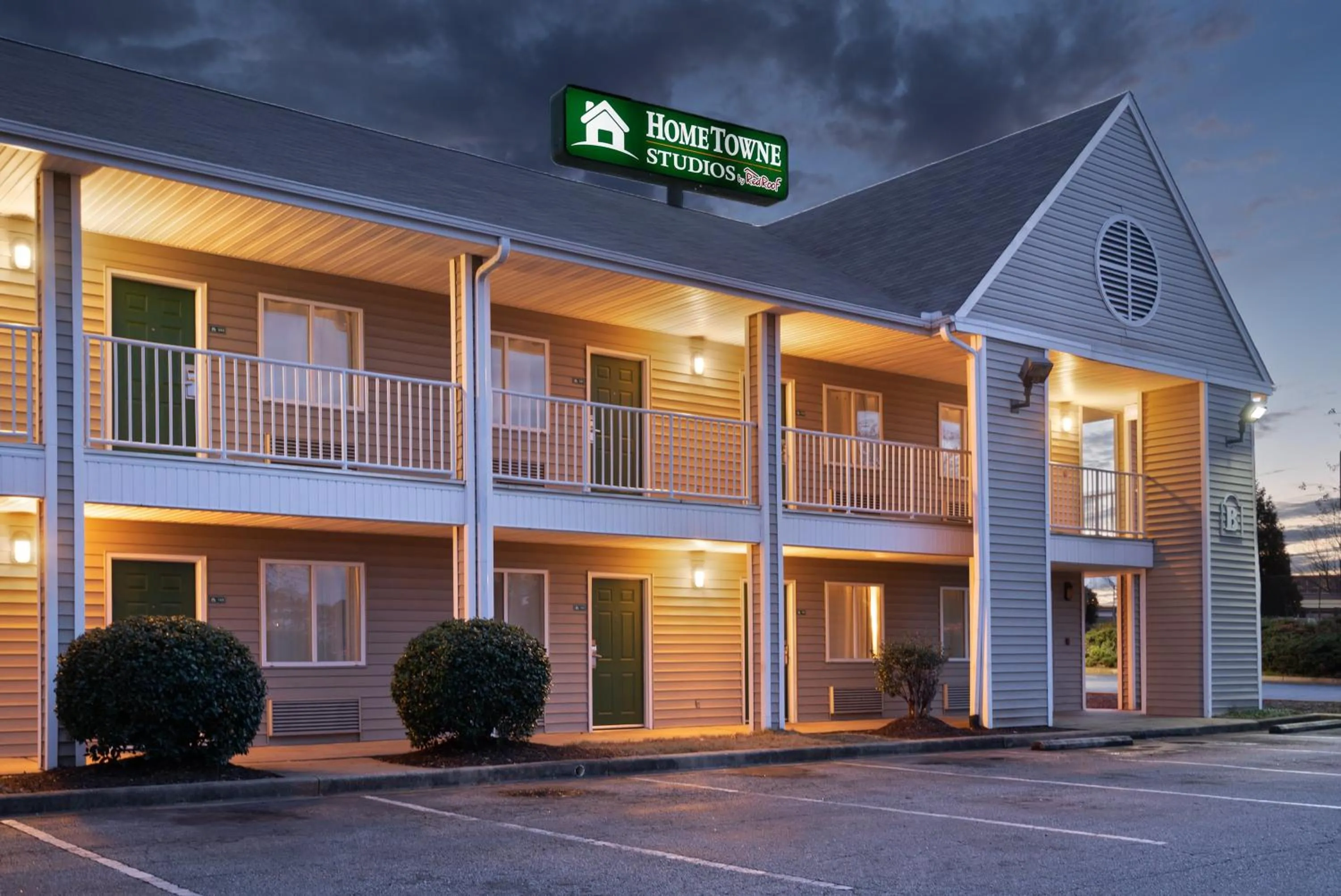 Property building in HomeTowne Studios by Red Roof Spartanburg - Asheville Highway