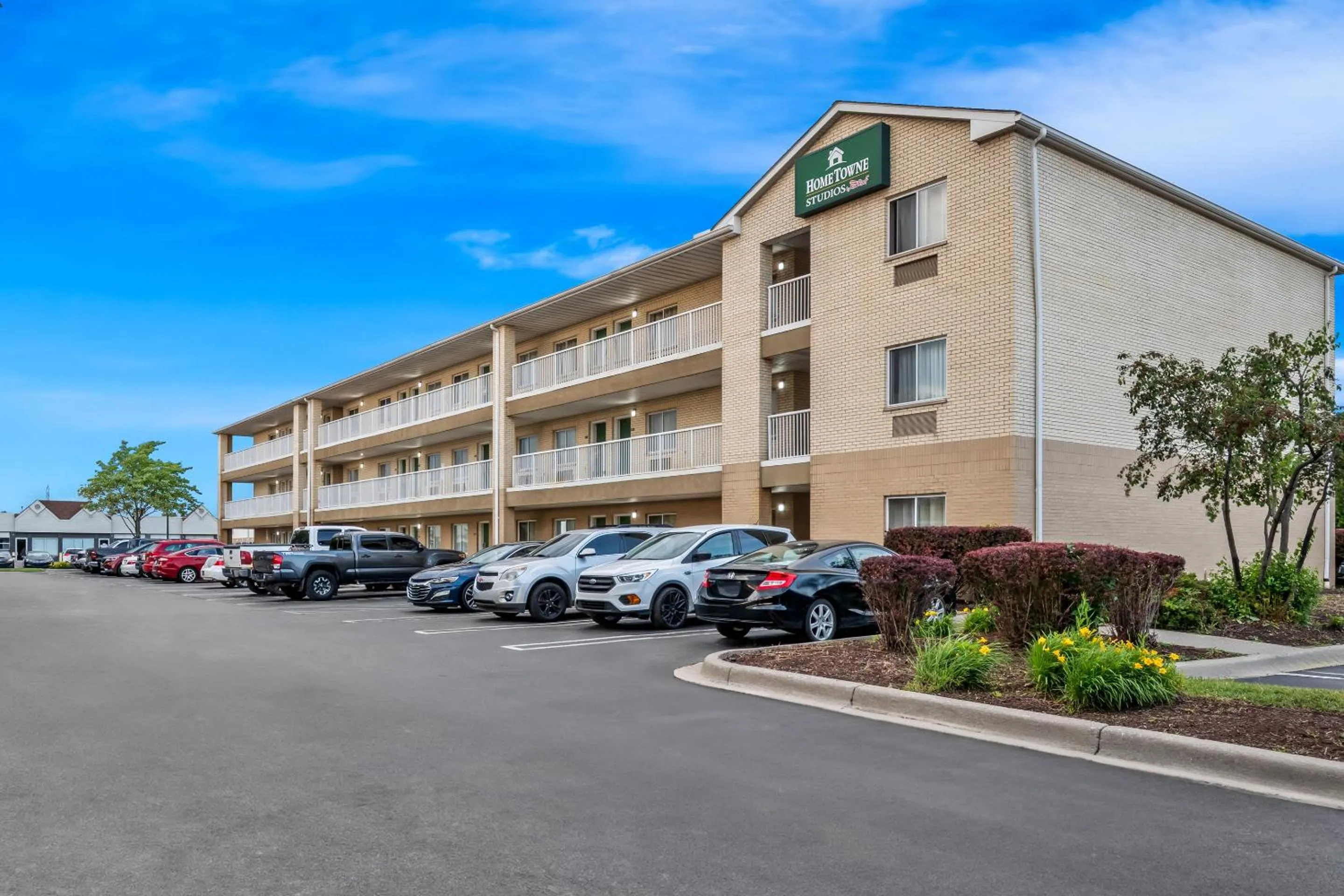 Property building in HomeTowne Studios by Red Roof Detroit - Livonia