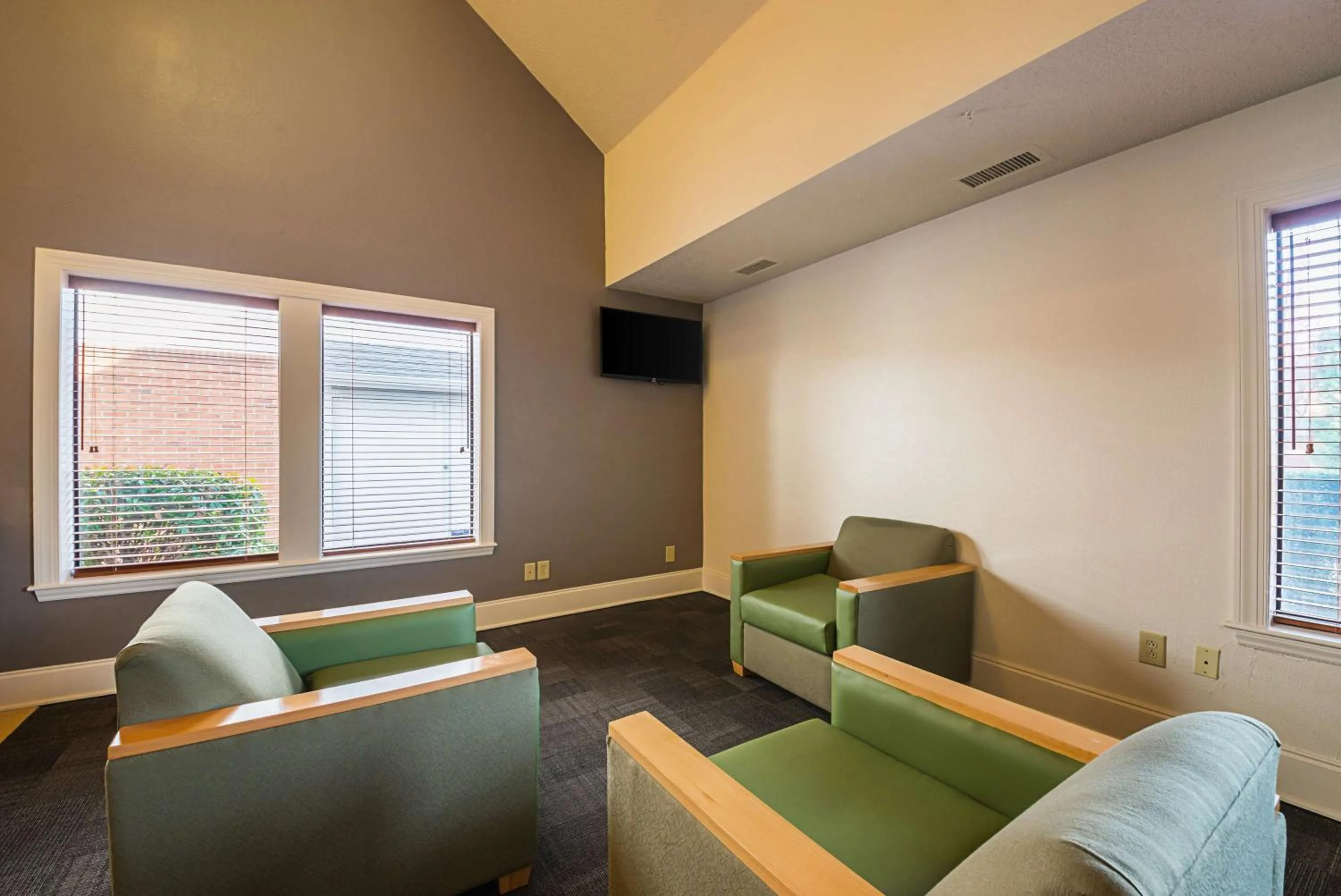 Communal lounge/ TV room in Studio 6-Greensboro, NC