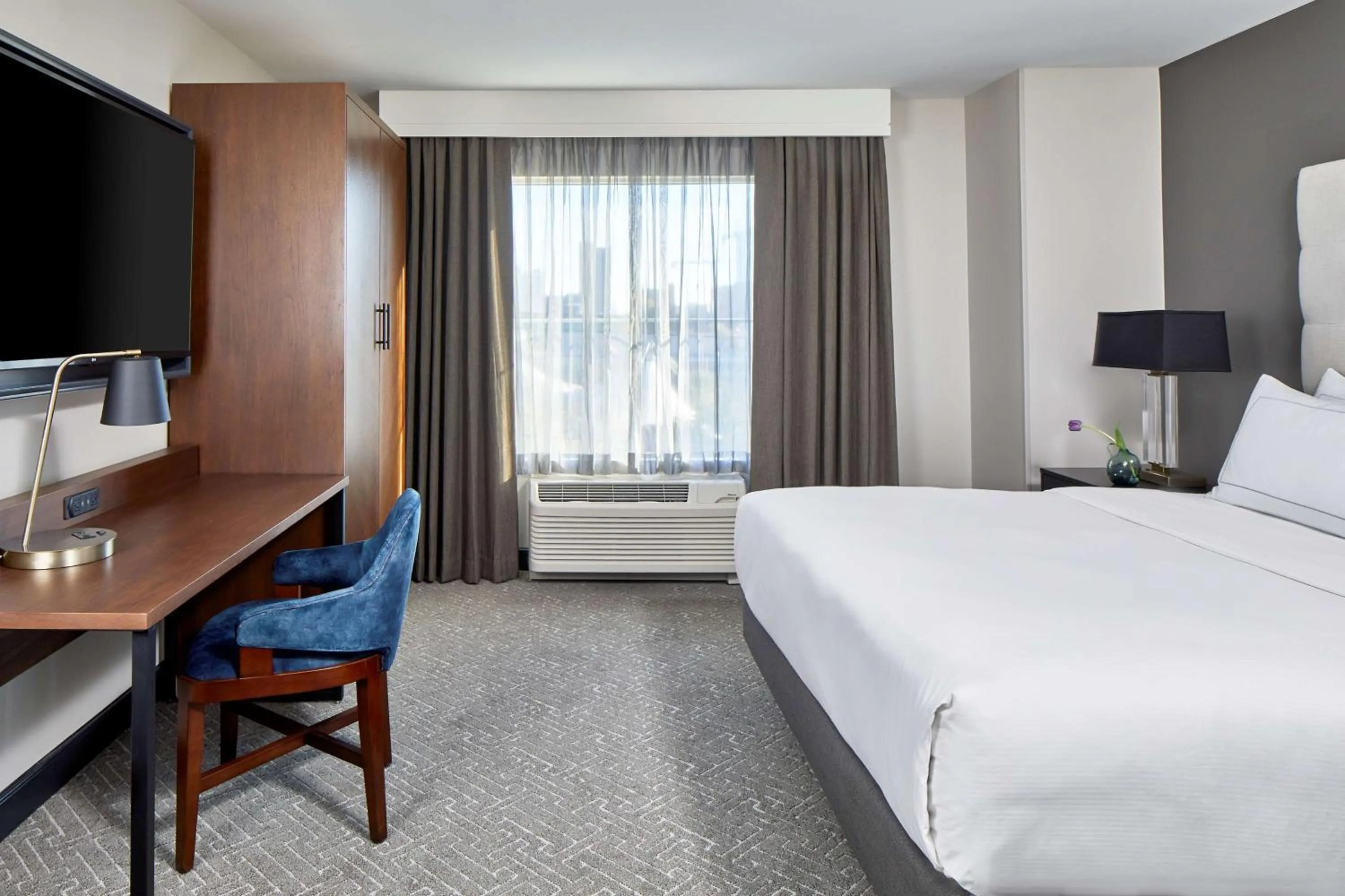 Bed in Cumberland House Knoxville, Tapestry Collection by Hilton