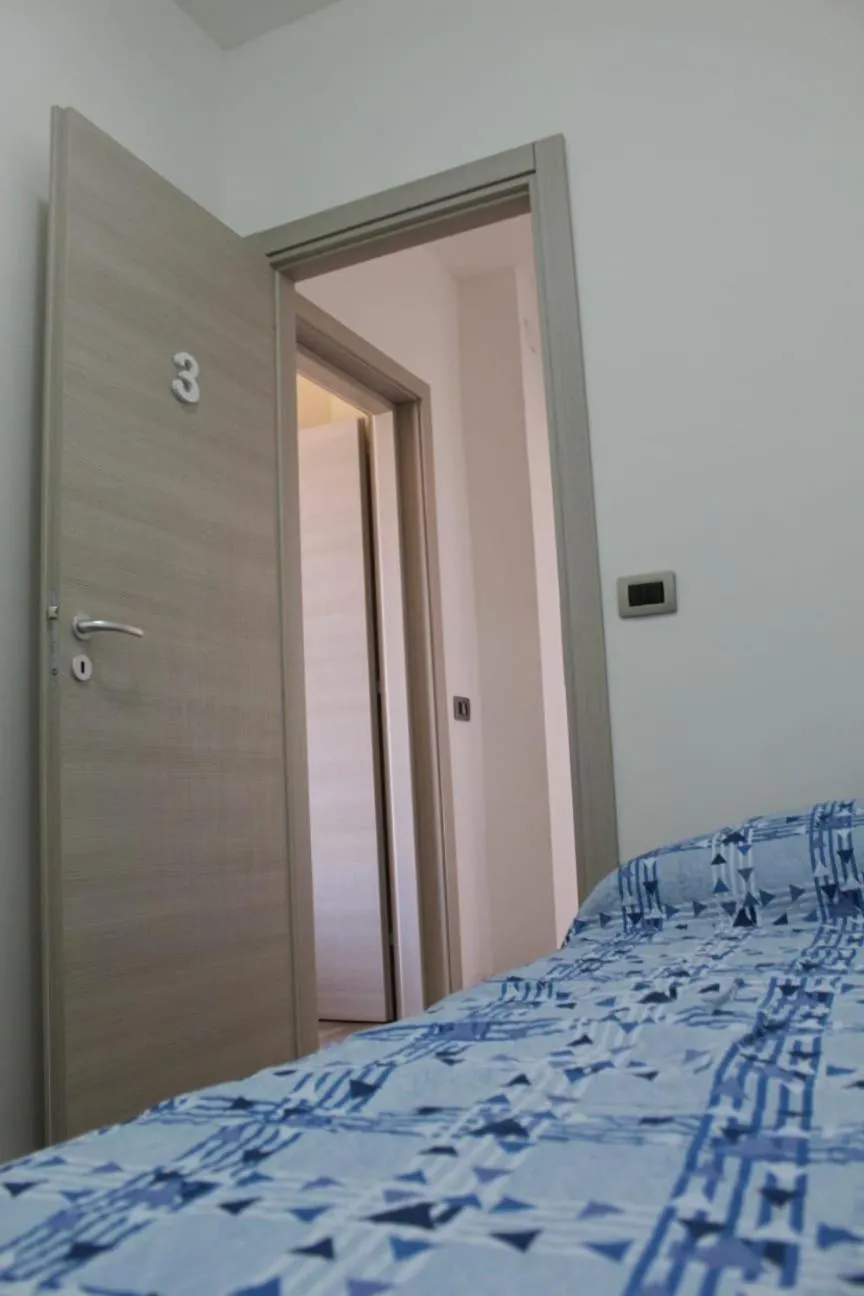 Bed in seaside room
