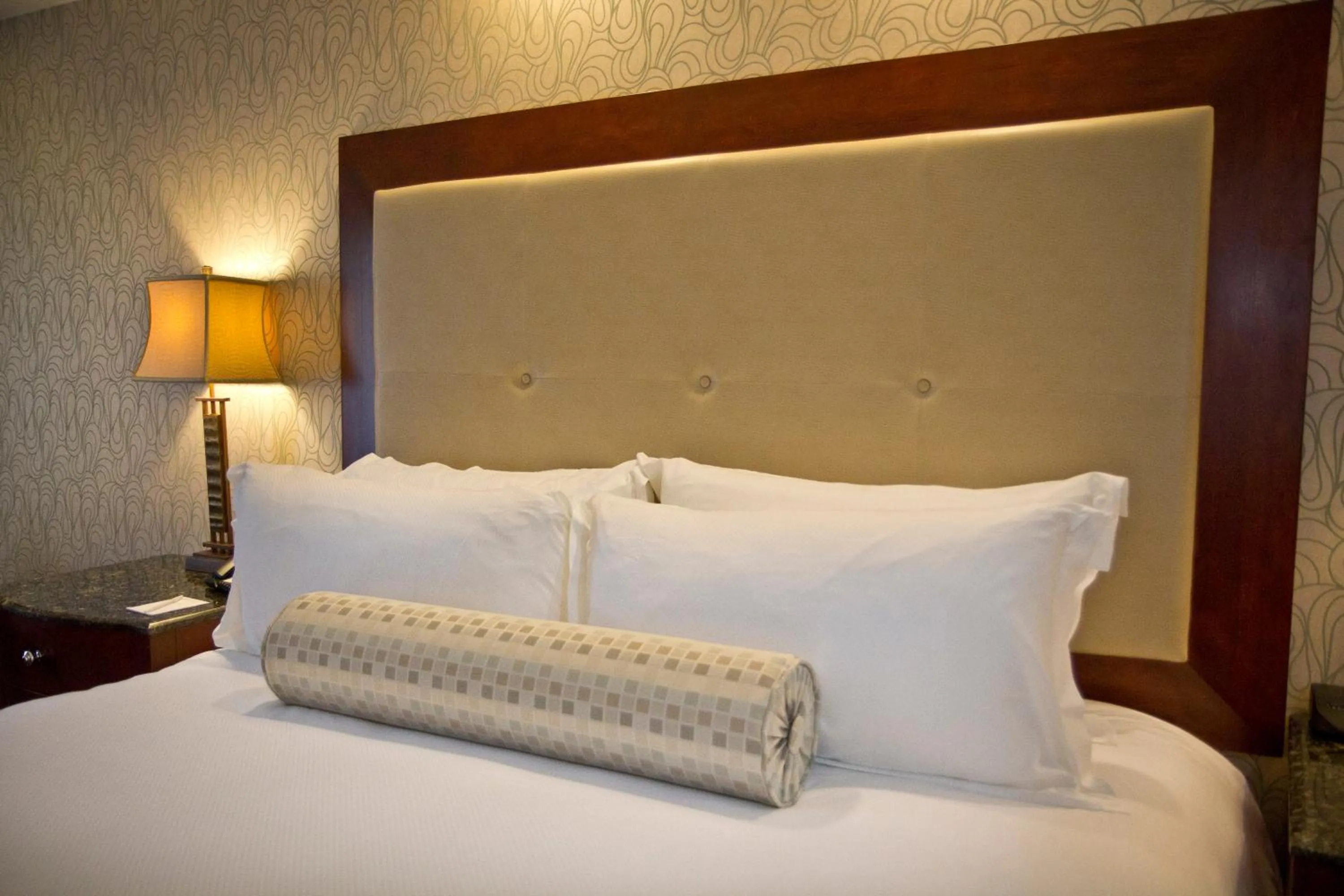 Bedroom in Town & Country Inn and Suites