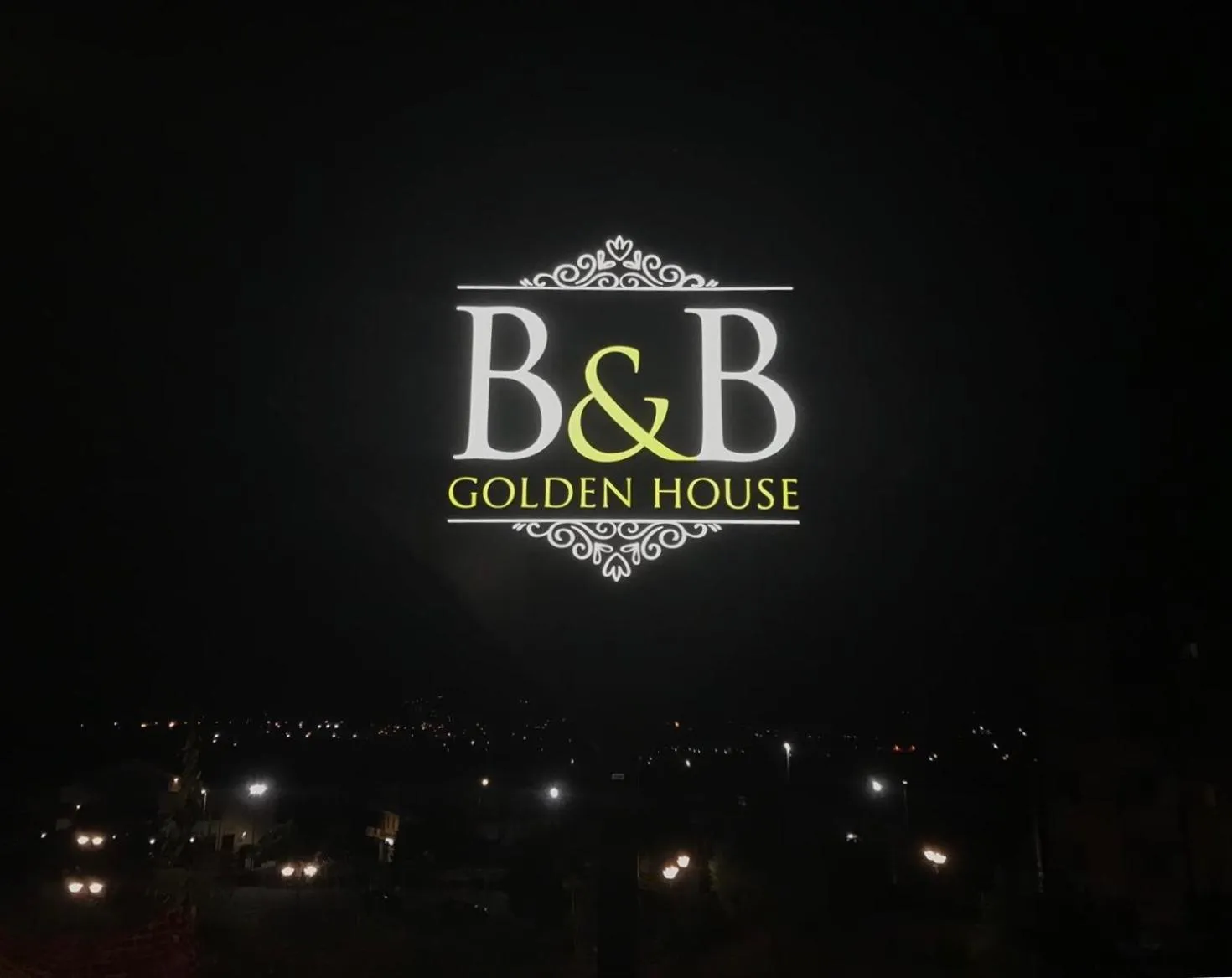 Property logo or sign in B&B Golden House & spa